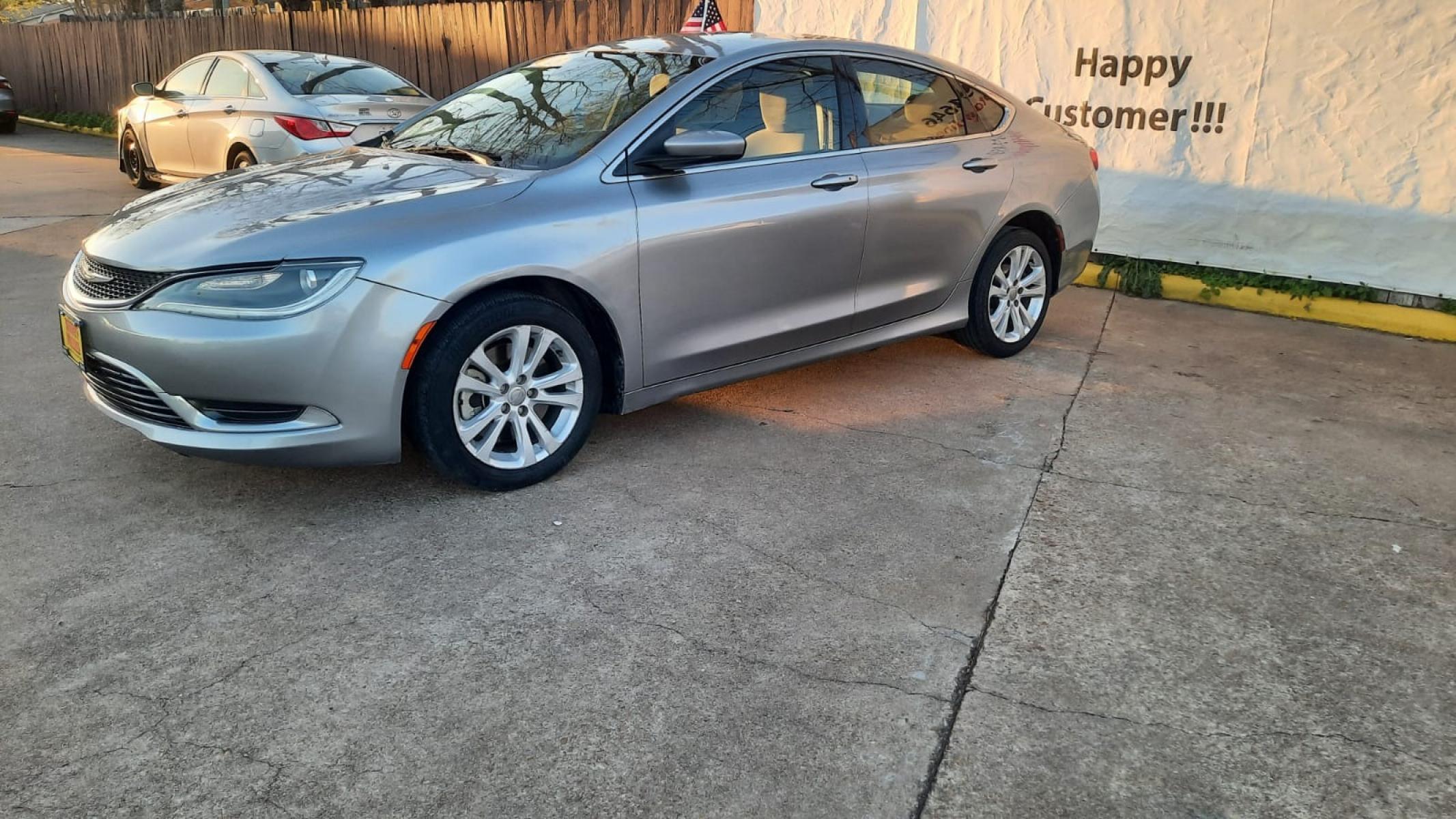 2015 Gray Chrysler 200 (1C3CCCAB5FN) with an 2.4L I4 2.4L I4 engine, Automatic 9-Speed transmission, located at 16710 Clay Rd., Houston, TX, 77084, (281) 859-7900, 29.834864, -95.656166 - Low Down. Low Payments. - Photo #1