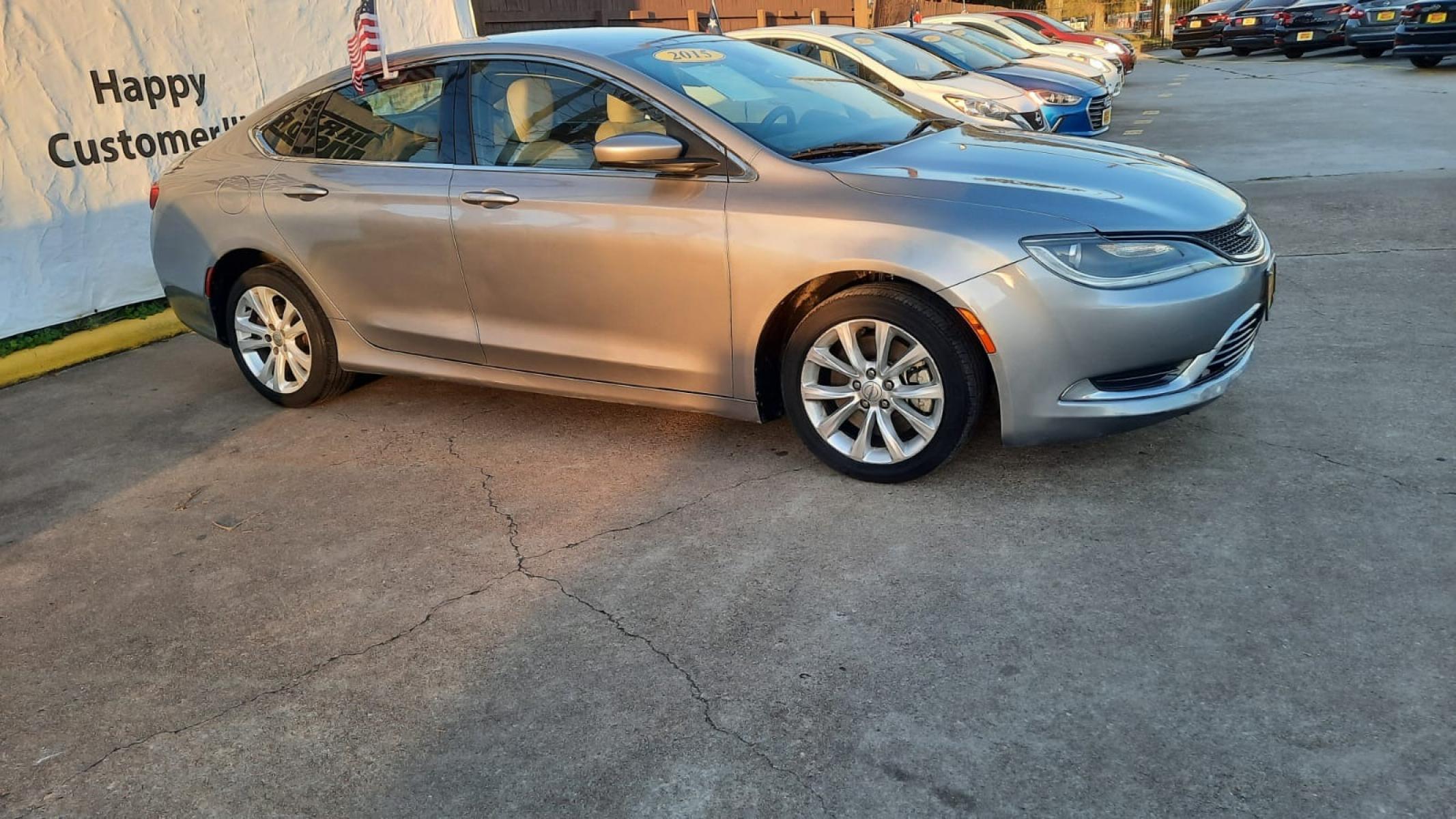 2015 Gray Chrysler 200 (1C3CCCAB5FN) with an 2.4L I4 2.4L I4 engine, Automatic 9-Speed transmission, located at 16710 Clay Rd., Houston, TX, 77084, (281) 859-7900, 29.834864, -95.656166 - Low Down. Low Payments. - Photo #2