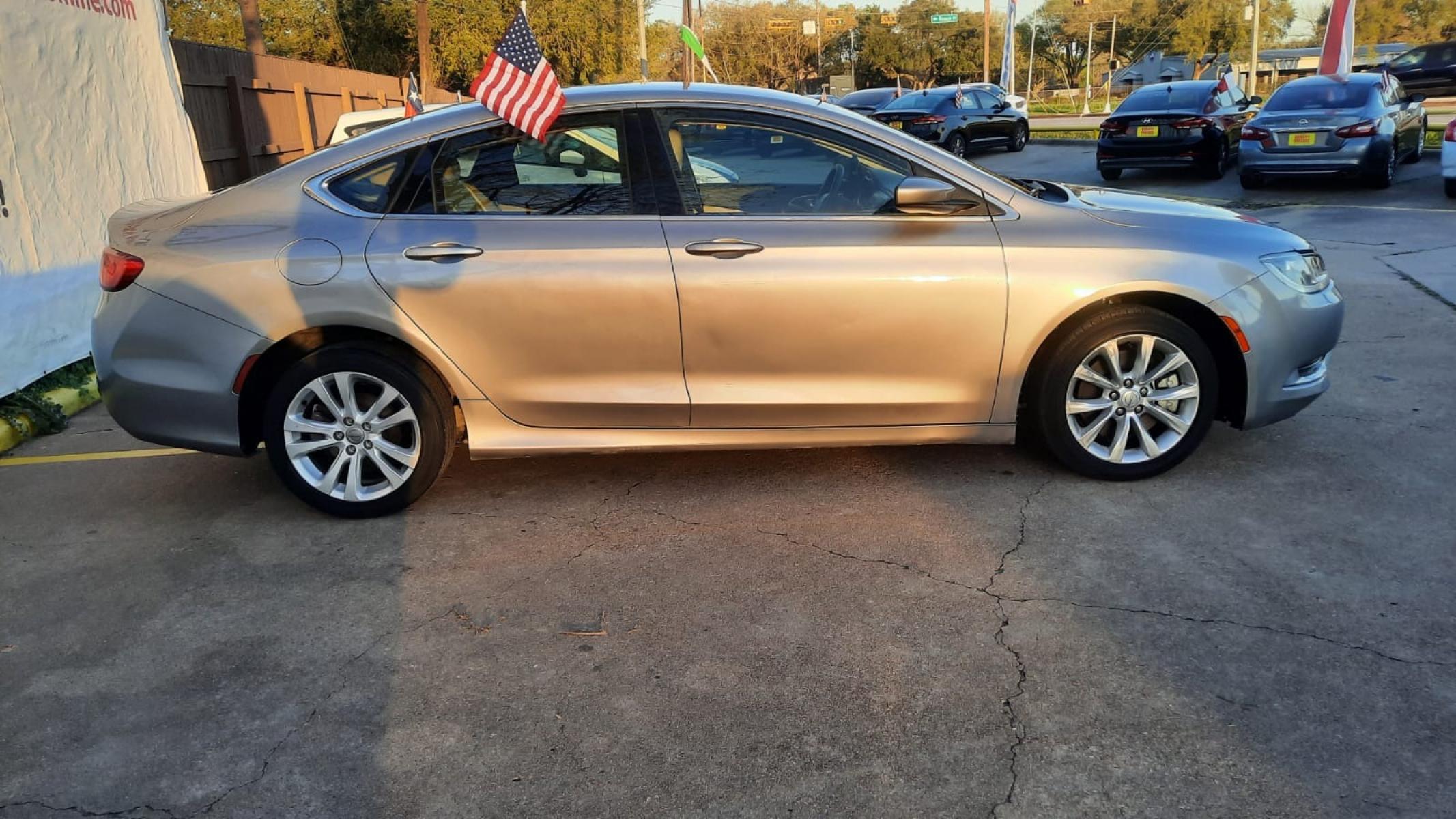 2015 Gray Chrysler 200 (1C3CCCAB5FN) with an 2.4L I4 2.4L I4 engine, Automatic 9-Speed transmission, located at 16710 Clay Rd., Houston, TX, 77084, (281) 859-7900, 29.834864, -95.656166 - Low Down. Low Payments. - Photo #3