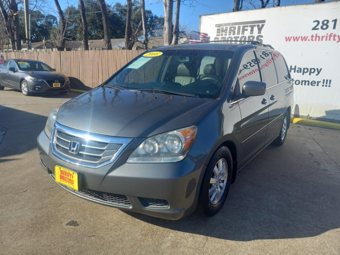 2008 Gray Honda Odyssey (5FNRL38648B) with an 3.5L V6 3.5L V6 engine, Automatic 5-Speed transmission, located at 16710 Clay Rd., Houston, TX, 77084, (281) 859-7900, 29.834864, -95.656166 - Photo#2