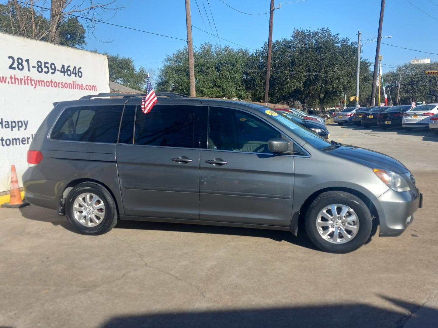 2008 Gray Honda Odyssey (5FNRL38648B) with an 3.5L V6 3.5L V6 engine, Automatic 5-Speed transmission, located at 16710 Clay Rd., Houston, TX, 77084, (281) 859-7900, 29.834864, -95.656166 - Photo#4