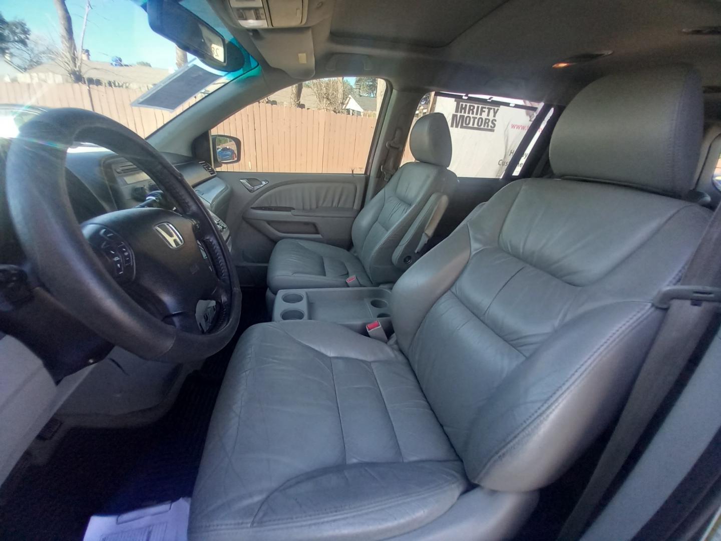 2008 Gray Honda Odyssey (5FNRL38648B) with an 3.5L V6 3.5L V6 engine, Automatic 5-Speed transmission, located at 16710 Clay Rd., Houston, TX, 77084, (281) 859-7900, 29.834864, -95.656166 - Photo#6