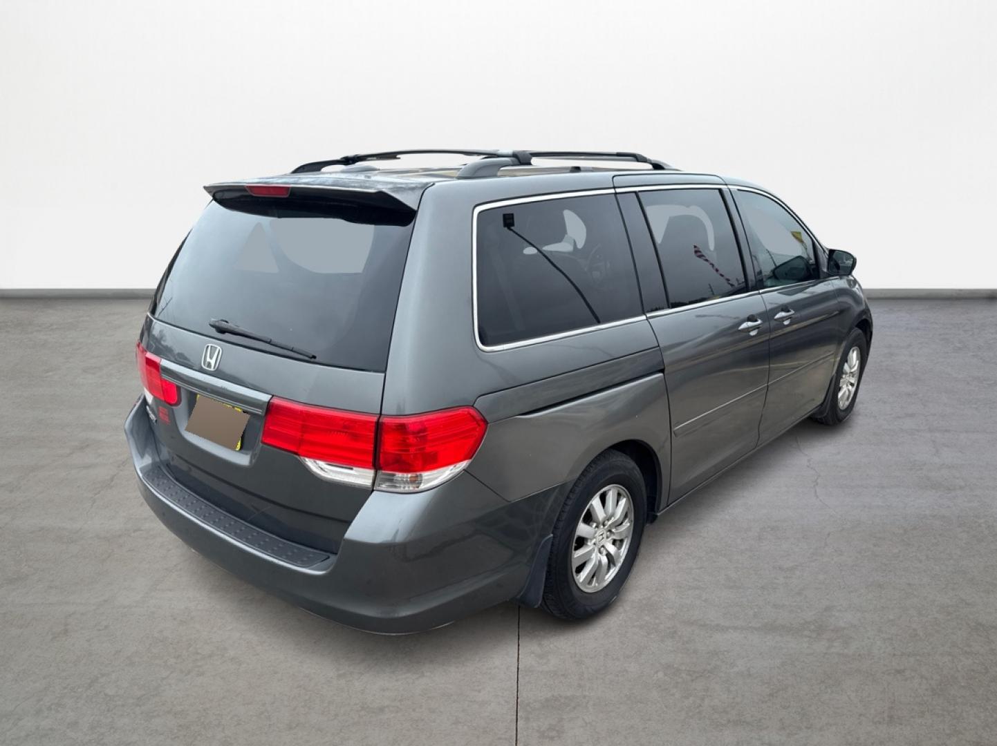 2008 Gray Honda Odyssey (5FNRL38648B) with an 3.5L V6 3.5L V6 engine, Automatic 5-Speed transmission, located at 16710 Clay Rd., Houston, TX, 77084, (281) 859-7900, 29.834864, -95.656166 - Low Down. Low Payments. - Photo#3