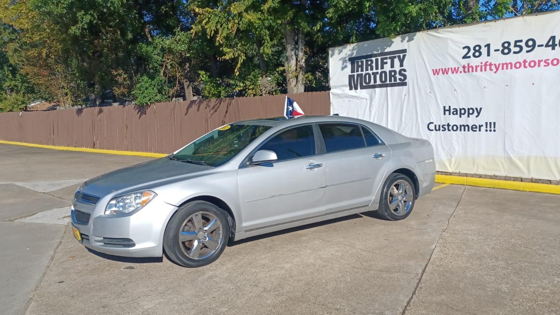 2012 Silver Chevrolet Malibu (1G1ZD5EU6CF) with an 2.4L I4 2.4L I4 engine, Automatic 6-Speed transmission, located at 16710 Clay Rd., Houston, TX, 77084, (281) 859-7900, 29.834864, -95.656166 - Photo #2