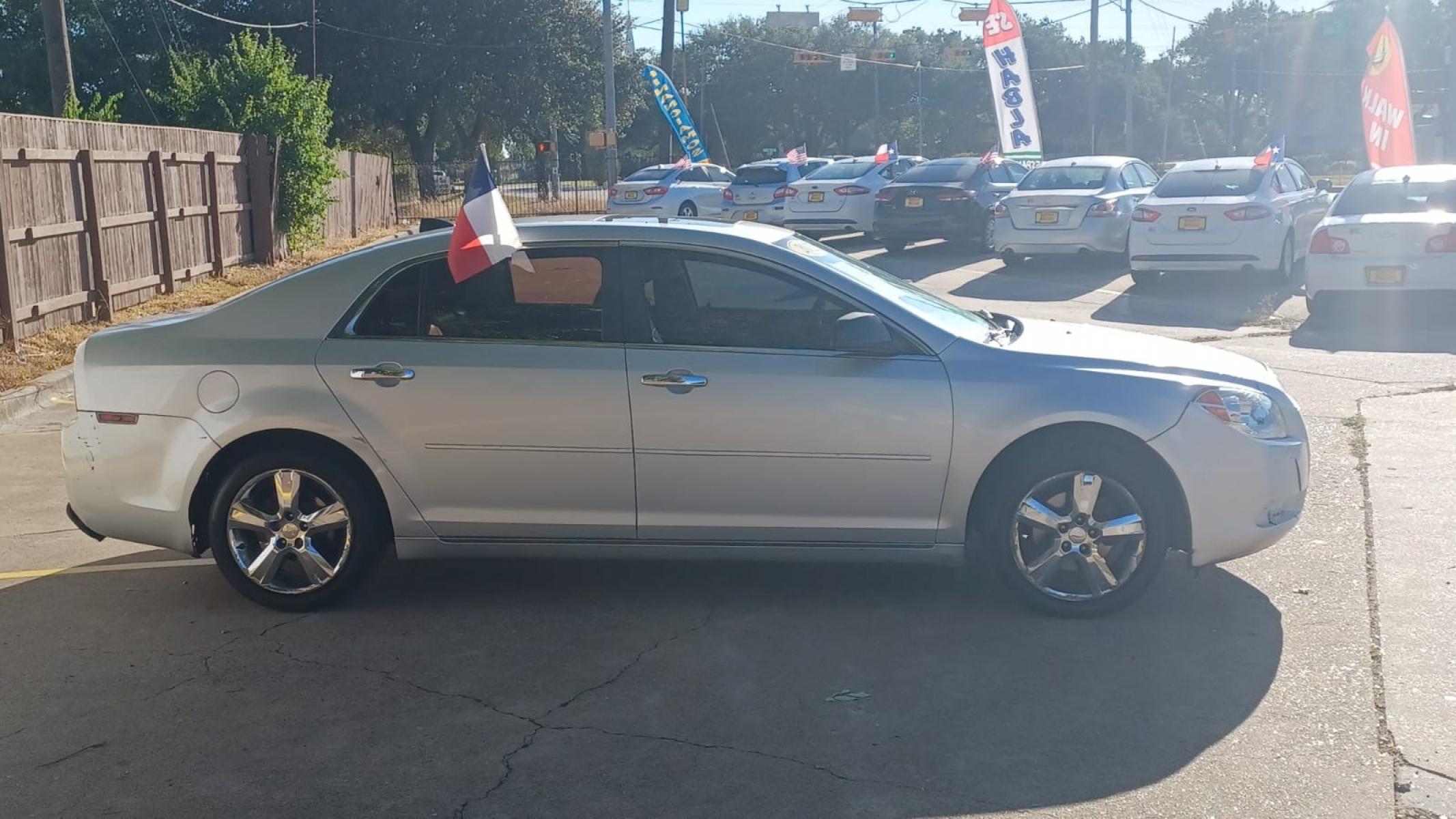 2012 Silver Chevrolet Malibu (1G1ZD5EU6CF) with an 2.4L I4 2.4L I4 engine, Automatic 6-Speed transmission, located at 16710 Clay Rd., Houston, TX, 77084, (281) 859-7900, 29.834864, -95.656166 - Photo #4