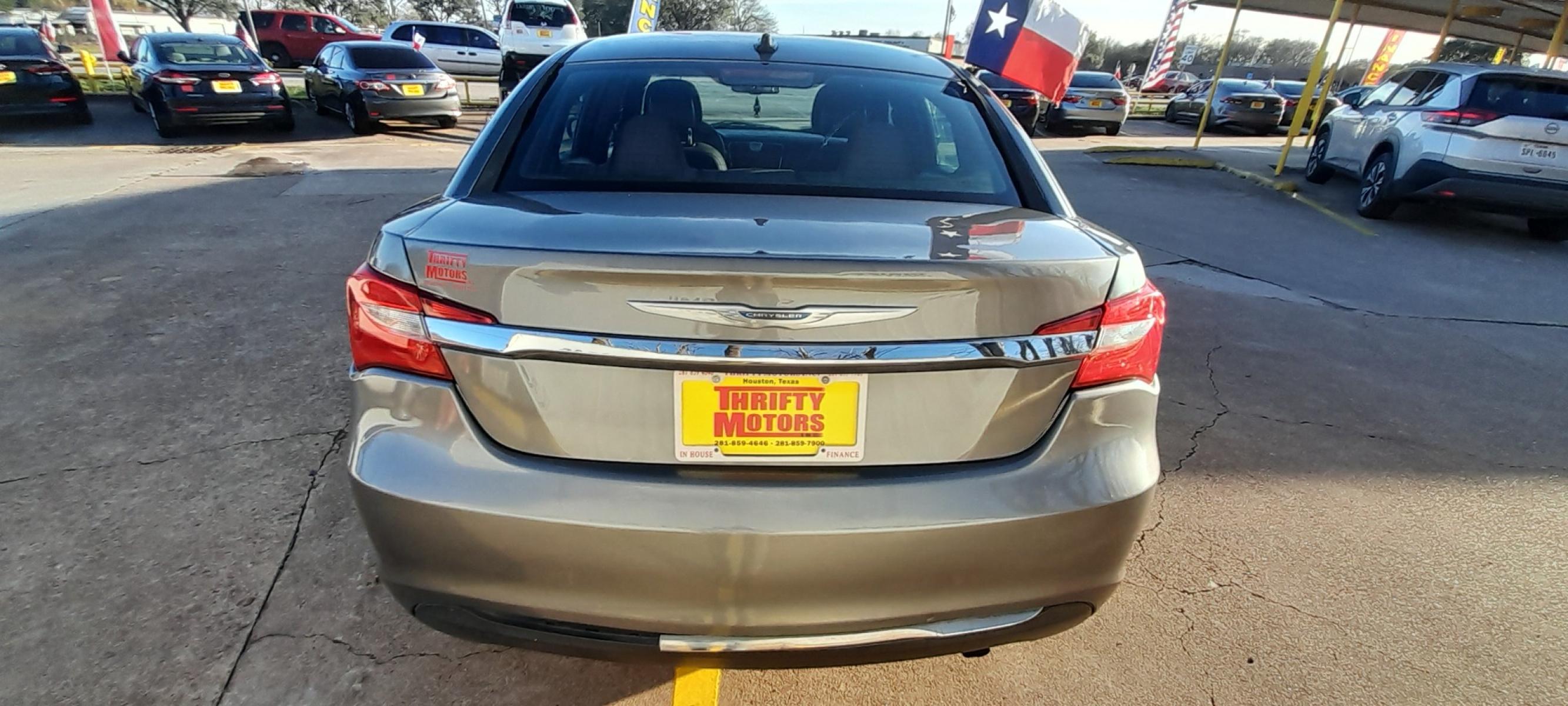2012 Gray Chrysler 200 (1C3CCBAB1CN) with an 2.4L I4 2.4L I4 engine, Automatic 6-Speed transmission, located at 16710 Clay Rd., Houston, TX, 77084, (281) 859-7900, 29.834864, -95.656166 - Low Down. Low Payments. - Photo #5