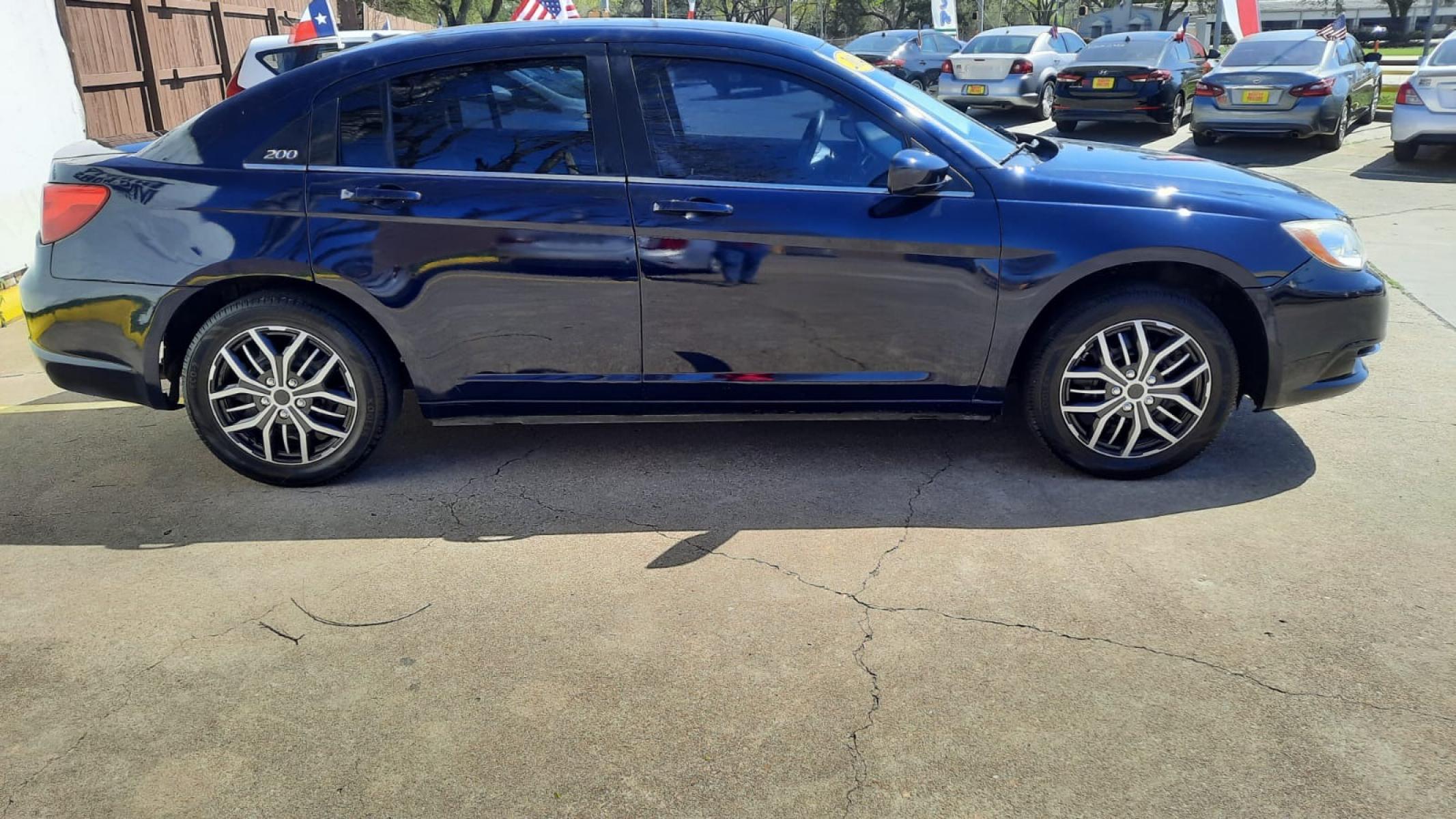 2014 Blue Chrysler 200 (1C3CCBAB6EN) with an 2.4L I4 2.4L I4 engine, Automatic 6-Speed transmission, located at 16710 Clay Rd., Houston, TX, 77084, (281) 859-7900, 29.834864, -95.656166 - Low Down. Low Payments. - Photo #1