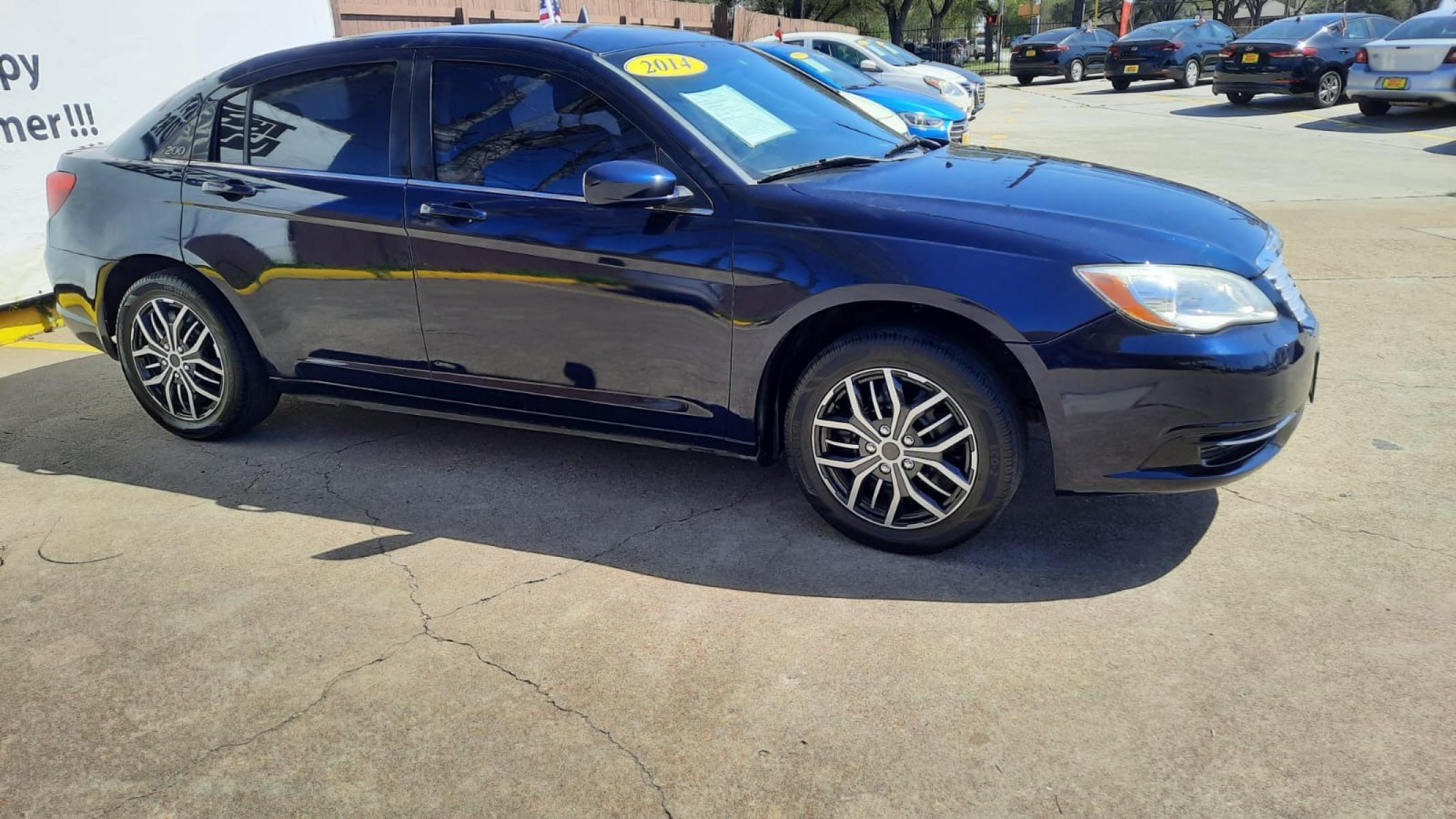 2014 Blue Chrysler 200 (1C3CCBAB6EN) with an 2.4L I4 2.4L I4 engine, Automatic 6-Speed transmission, located at 16710 Clay Rd., Houston, TX, 77084, (281) 859-7900, 29.834864, -95.656166 - Low Down. Low Payments. - Photo #2