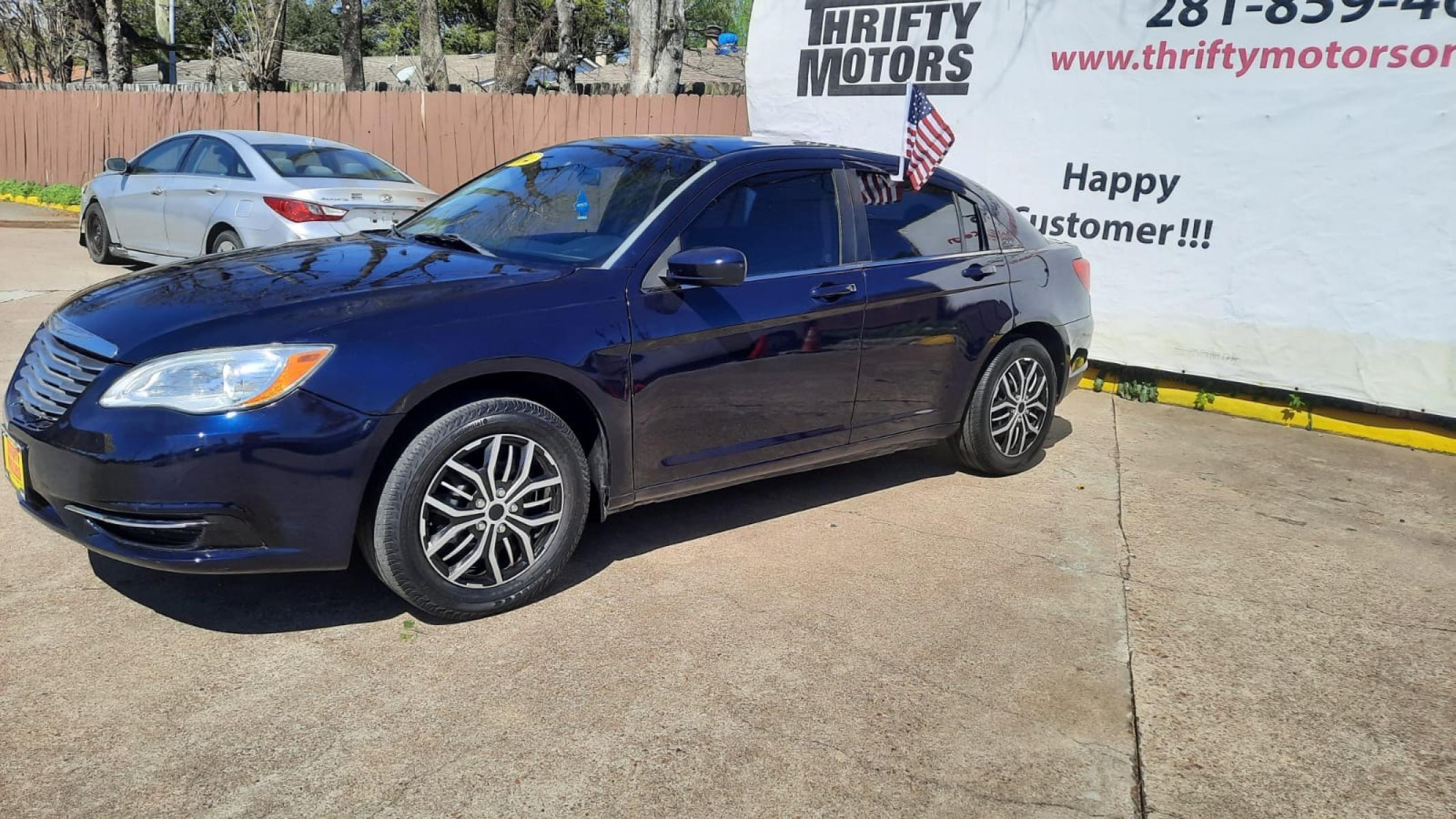 2014 Blue Chrysler 200 (1C3CCBAB6EN) with an 2.4L I4 2.4L I4 engine, Automatic 6-Speed transmission, located at 16710 Clay Rd., Houston, TX, 77084, (281) 859-7900, 29.834864, -95.656166 - Low Down. Low Payments. - Photo #3