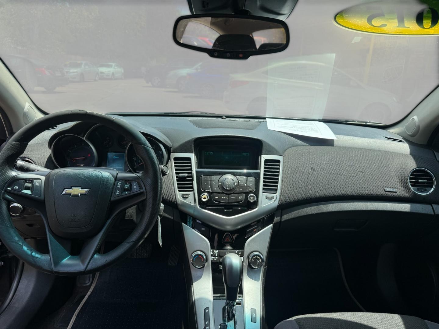 2015 Black Chevrolet Cruze (1G1PC5SB8F7) with an 1.4L I4 Turbocharger 1.4L I4 engine, Automatic 6-Speed transmission, located at 16710 Clay Rd., Houston, TX, 77084, (281) 859-7900, 29.834864, -95.656166- Photo#9