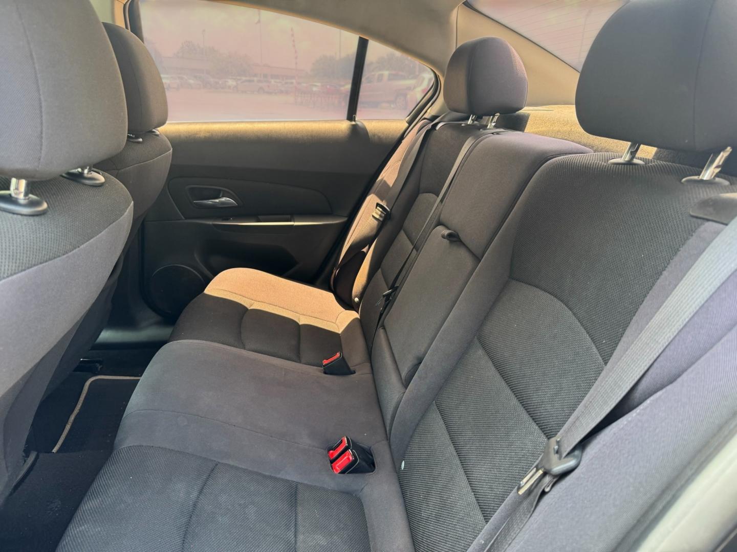2015 Black Chevrolet Cruze (1G1PC5SB8F7) with an 1.4L I4 Turbocharger 1.4L I4 engine, Automatic 6-Speed transmission, located at 16710 Clay Rd., Houston, TX, 77084, (281) 859-7900, 29.834864, -95.656166- Photo#11