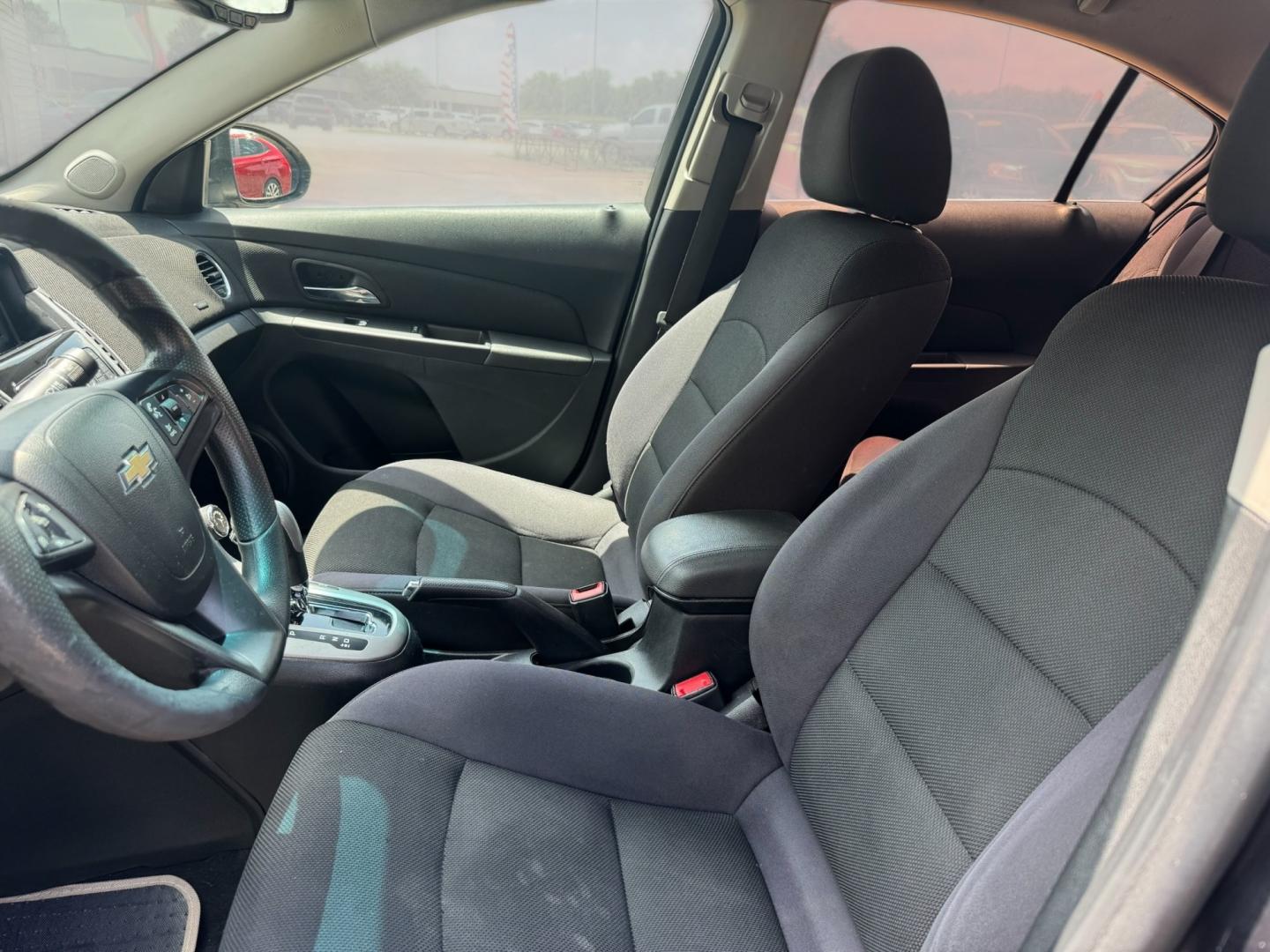 2015 Black Chevrolet Cruze (1G1PC5SB8F7) with an 1.4L I4 Turbocharger 1.4L I4 engine, Automatic 6-Speed transmission, located at 16710 Clay Rd., Houston, TX, 77084, (281) 859-7900, 29.834864, -95.656166- Photo#10