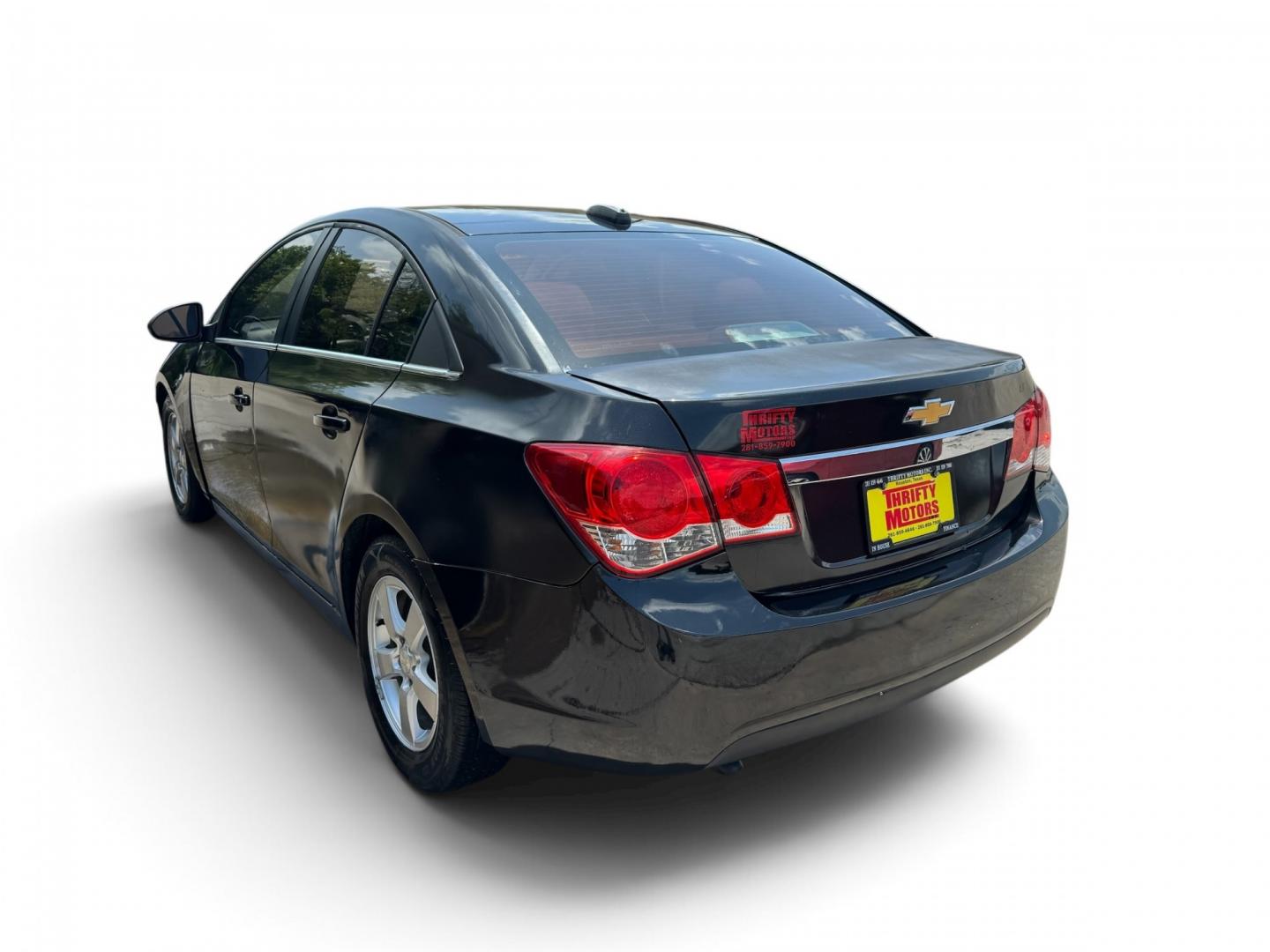 2015 Black Chevrolet Cruze (1G1PC5SB8F7) with an 1.4L I4 Turbocharger 1.4L I4 engine, Automatic 6-Speed transmission, located at 16710 Clay Rd., Houston, TX, 77084, (281) 859-7900, 29.834864, -95.656166- Photo#4