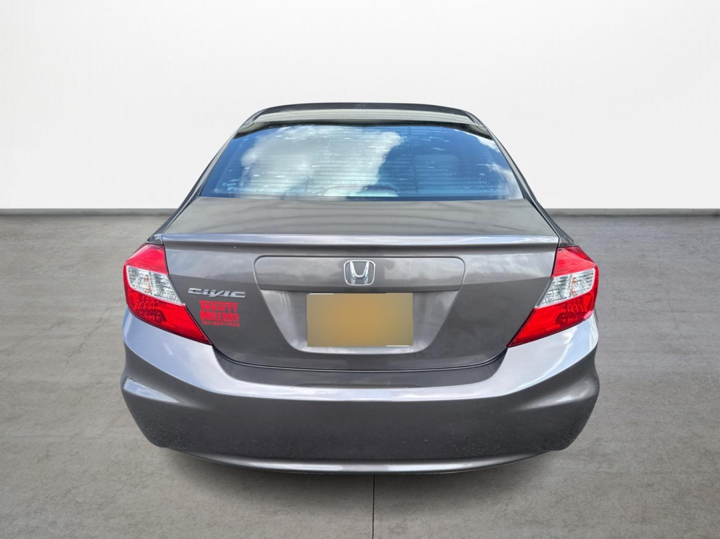 2012 Brown Honda Civic (2HGFB2F5XCH) with an 1.8L I4 1.8L I4 engine, Automatic 5-Speed transmission, located at 16710 Clay Rd., Houston, TX, 77084, (281) 859-7900, 29.834864, -95.656166 - Low Down. Low Payments. - Photo#5