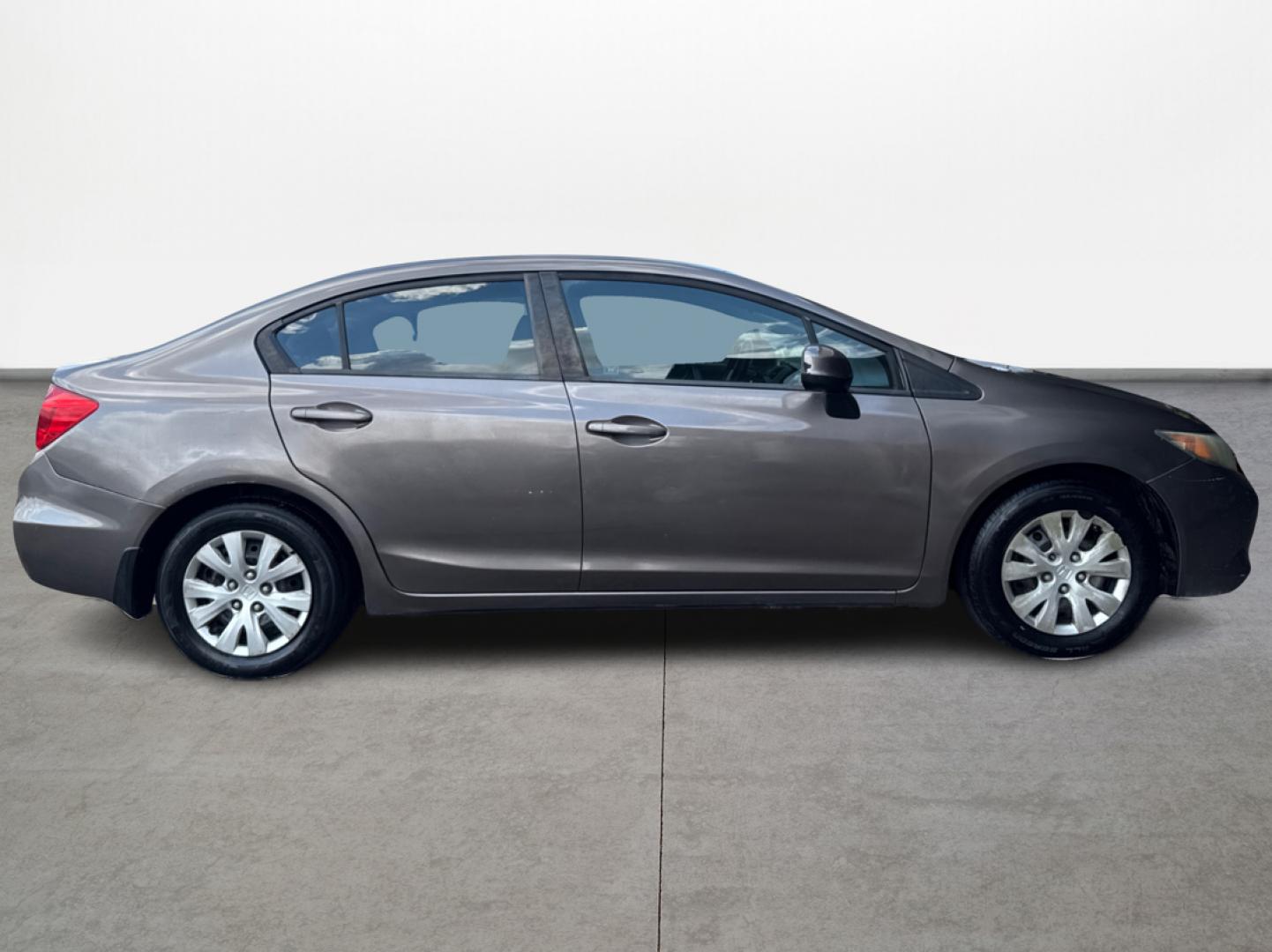 2012 Brown Honda Civic (2HGFB2F5XCH) with an 1.8L I4 1.8L I4 engine, Automatic 5-Speed transmission, located at 16710 Clay Rd., Houston, TX, 77084, (281) 859-7900, 29.834864, -95.656166 - Low Down. Low Payments. - Photo#3