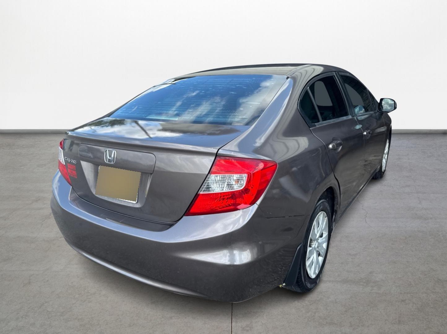 2012 Brown Honda Civic (2HGFB2F5XCH) with an 1.8L I4 1.8L I4 engine, Automatic 5-Speed transmission, located at 16710 Clay Rd., Houston, TX, 77084, (281) 859-7900, 29.834864, -95.656166 - Low Down. Low Payments. - Photo#4