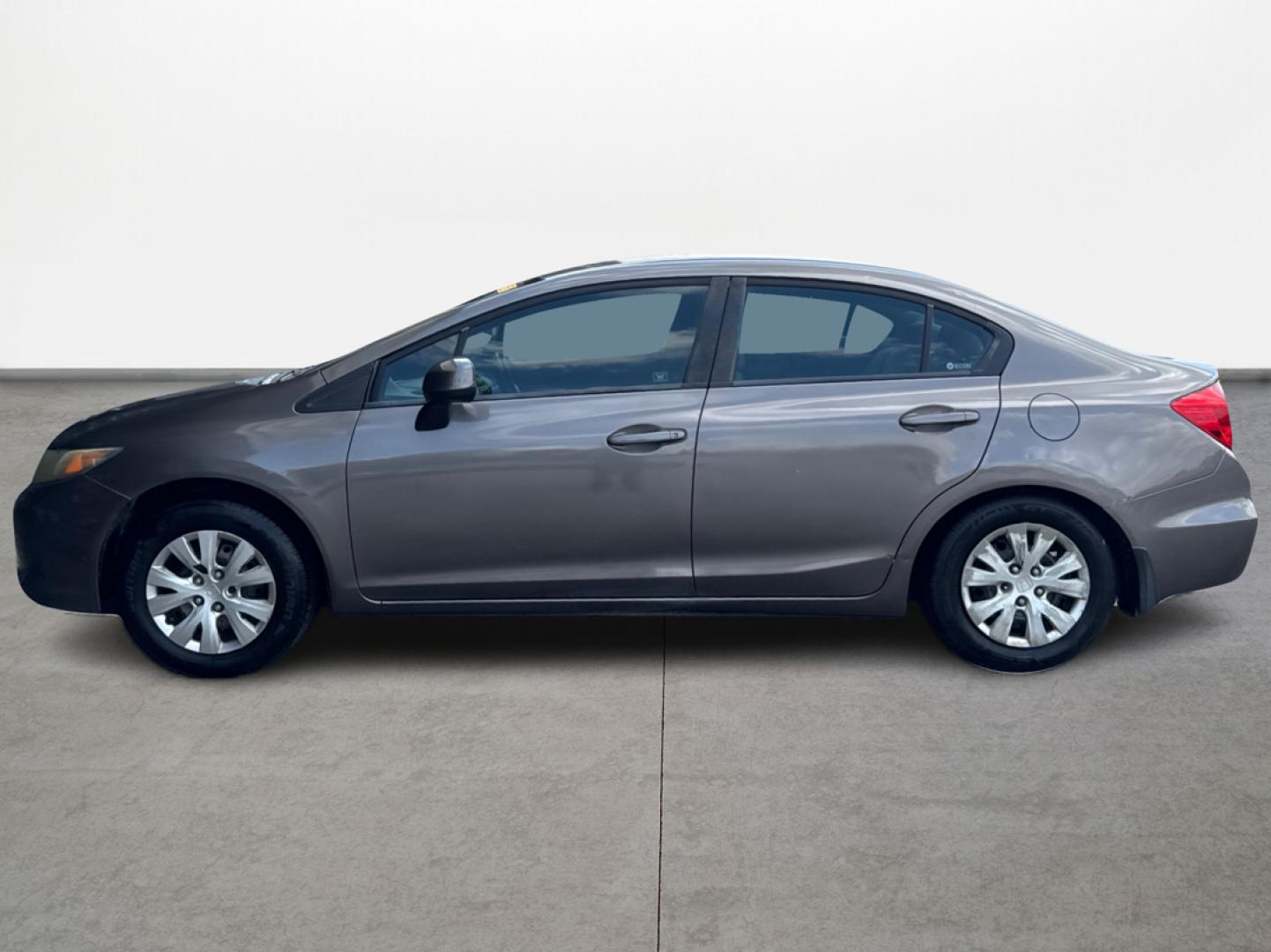2012 Brown Honda Civic (2HGFB2F5XCH) with an 1.8L I4 1.8L I4 engine, Automatic 5-Speed transmission, located at 16710 Clay Rd., Houston, TX, 77084, (281) 859-7900, 29.834864, -95.656166 - Low Down. Low Payments. - Photo#7