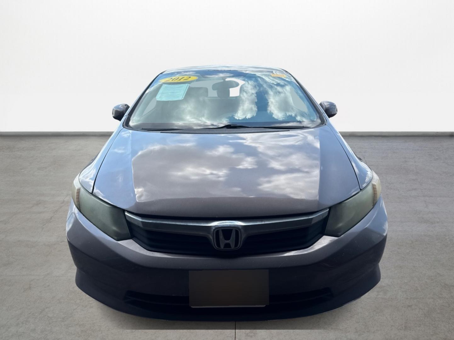 2012 Brown Honda Civic (2HGFB2F5XCH) with an 1.8L I4 1.8L I4 engine, Automatic 5-Speed transmission, located at 16710 Clay Rd., Houston, TX, 77084, (281) 859-7900, 29.834864, -95.656166 - Low Down. Low Payments. - Photo#1