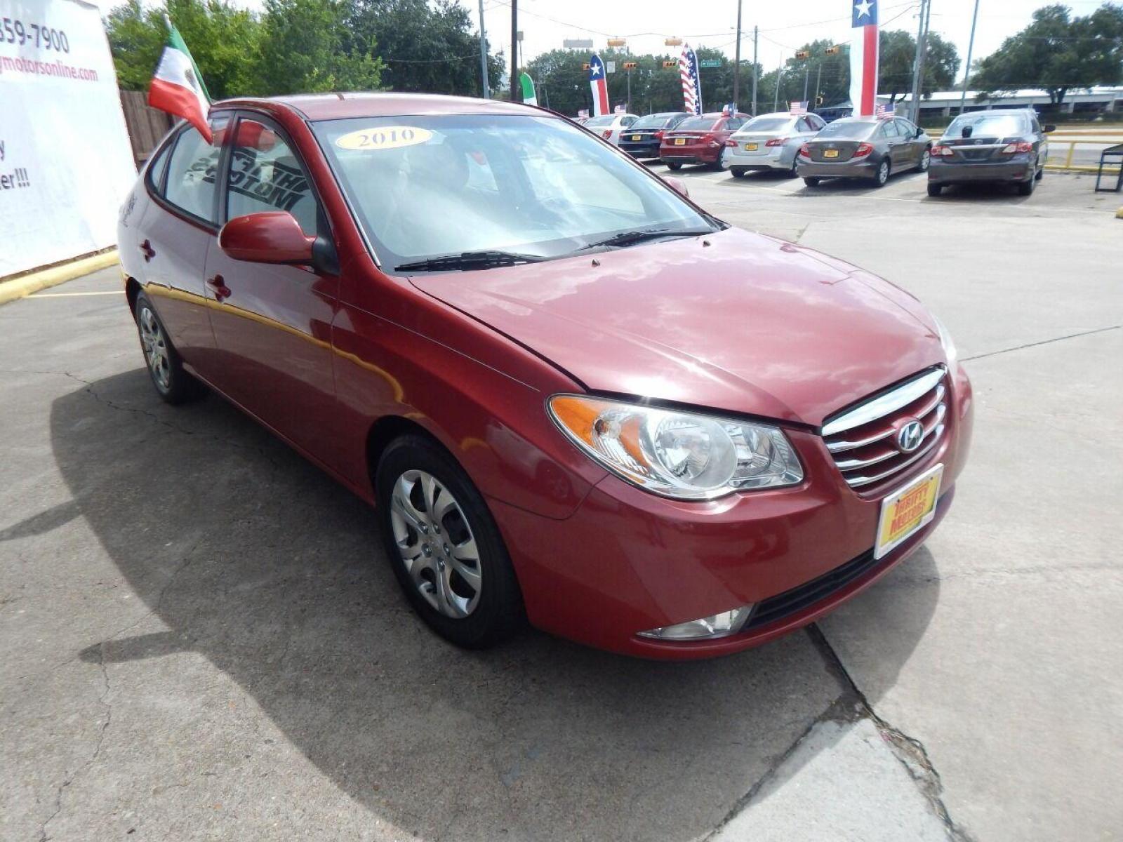 2010 Red Hyundai Elantra (KMHDU4AD7AU) with an 2.0L I4 2.0L I4 engine, Automatic 4-Speed transmission, located at 16710 Clay Rd., Houston, TX, 77084, (281) 859-7900, 29.834864, -95.656166 - Low Down. Low Payments. - Photo #2