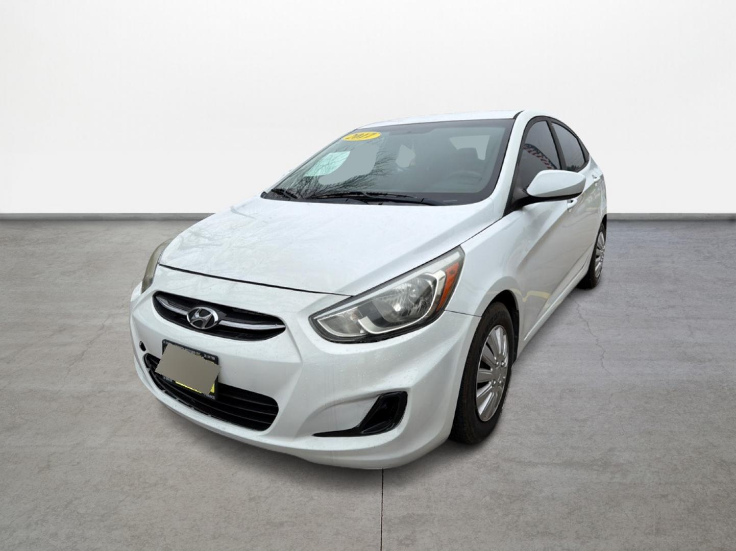 2017 White /Gray Hyundai Accent SE 4-Door 6M (KMHCT4AE5HU) with an 1.6L L4 DOHC 16V engine, 6M transmission, located at 16710 Clay Rd., Houston, TX, 77084, (281) 859-7900, 29.834864, -95.656166 - Photo#0