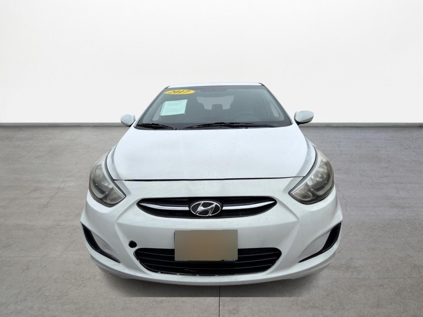2017 White /Gray Hyundai Accent SE 4-Door 6M (KMHCT4AE5HU) with an 1.6L L4 DOHC 16V engine, 6M transmission, located at 16710 Clay Rd., Houston, TX, 77084, (281) 859-7900, 29.834864, -95.656166 - Photo#1