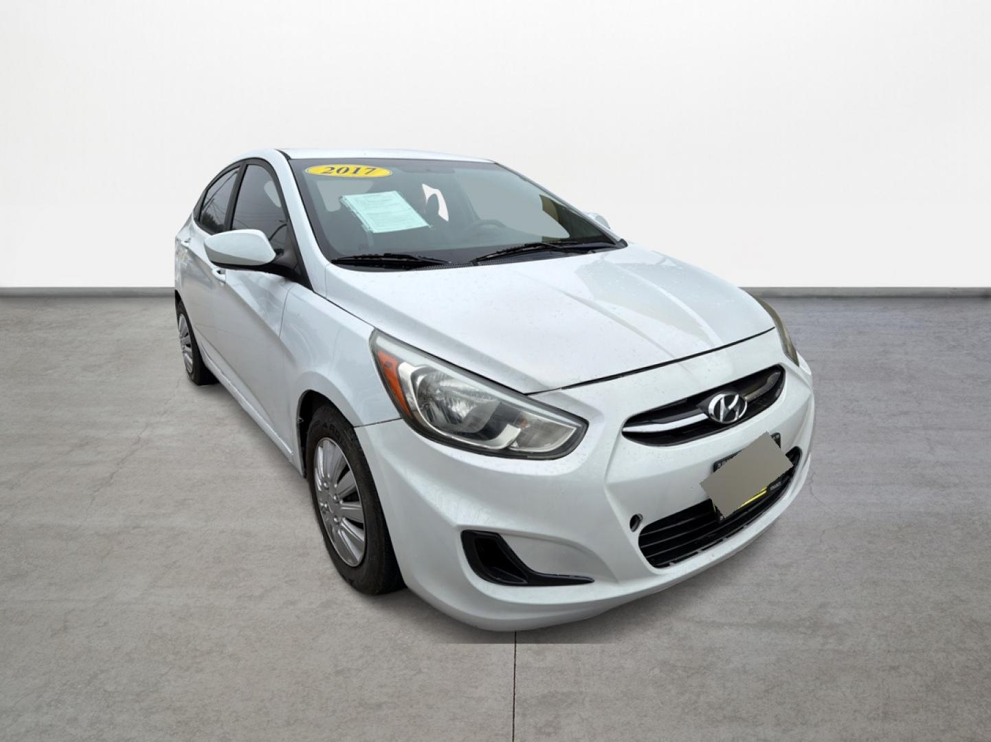 2017 White /Gray Hyundai Accent SE 4-Door 6M (KMHCT4AE5HU) with an 1.6L L4 DOHC 16V engine, 6M transmission, located at 16710 Clay Rd., Houston, TX, 77084, (281) 859-7900, 29.834864, -95.656166 - Photo#2