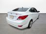 2017 White /Gray Hyundai Accent SE 4-Door 6M (KMHCT4AE5HU) with an 1.6L L4 DOHC 16V engine, 6M transmission, located at 16710 Clay Rd., Houston, TX, 77084, (281) 859-7900, 29.834864, -95.656166 - Photo#4