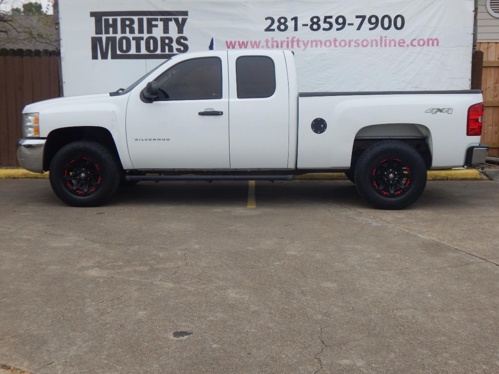 2012 White Chevrolet Silverado 1500 Work Truck Ext. Cab 4WD (1GCRKPEA6CZ) with an 4.8L V8 OHV 16V engine, 4-Speed Automatic transmission, located at 16710 Clay Rd., Houston, TX, 77084, (281) 859-7900, 29.834864, -95.656166 - Low Down. Low Payments. - Photo #0