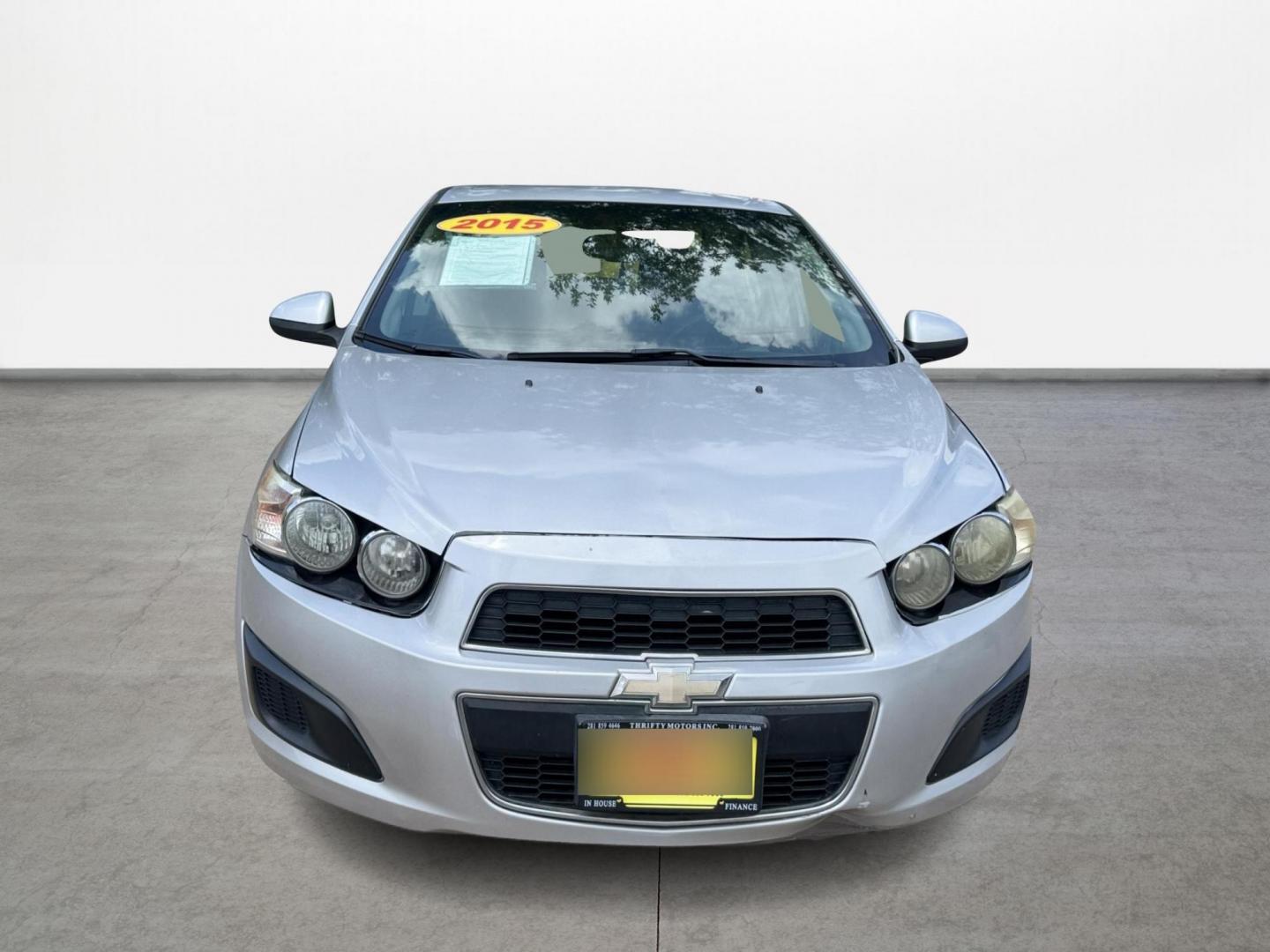 2015 Silver Chevrolet Sonic LT Auto Sedan (1G1JC5SH0F4) with an 1.8L L4 DOHC 24V engine, Automatic transmission, located at 16710 Clay Rd., Houston, TX, 77084, (281) 859-7900, 29.834864, -95.656166 - Low Down. Low Payments. - Photo#1