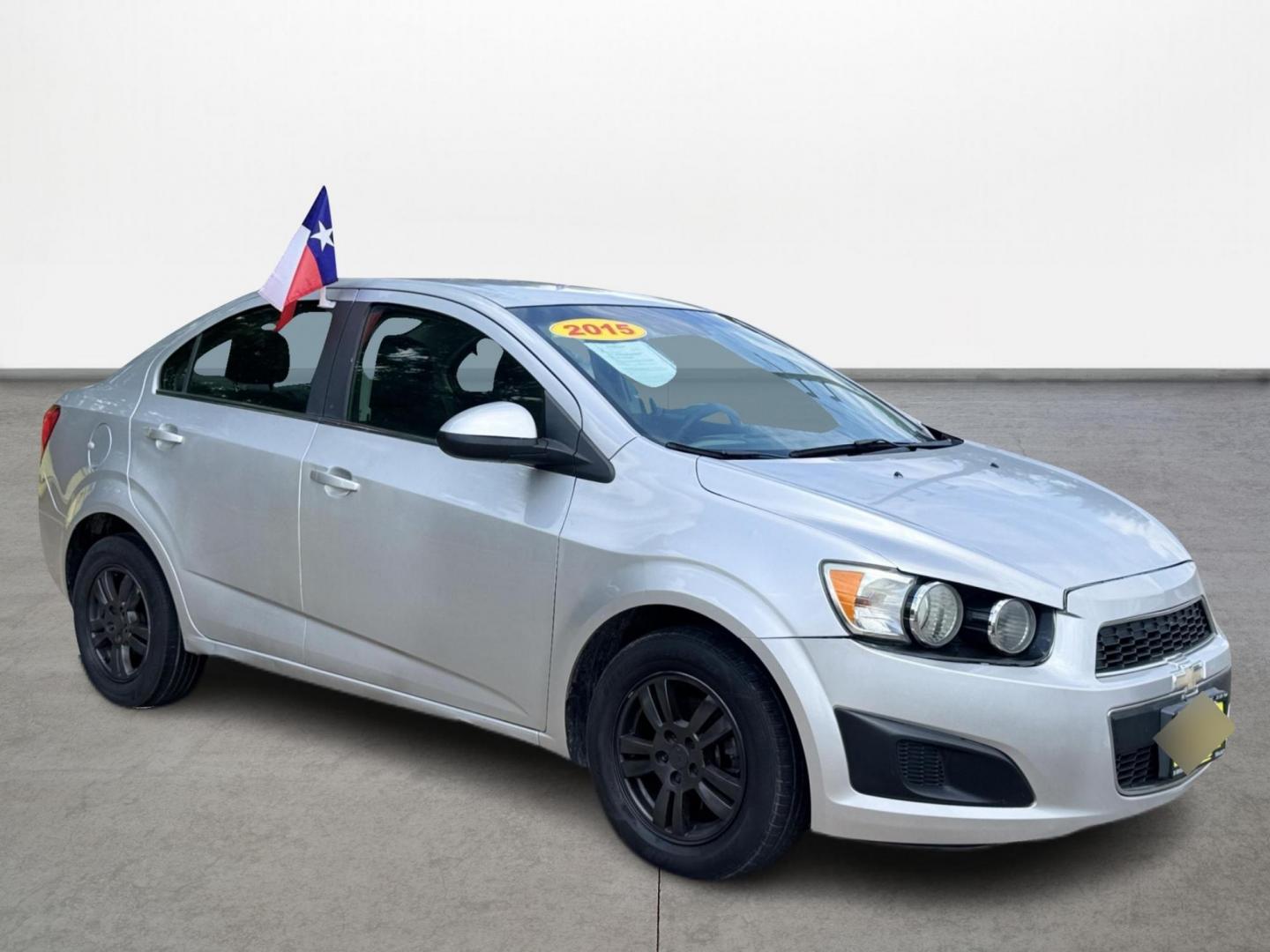 2015 Silver Chevrolet Sonic LT Auto Sedan (1G1JC5SH0F4) with an 1.8L L4 DOHC 24V engine, Automatic transmission, located at 16710 Clay Rd., Houston, TX, 77084, (281) 859-7900, 29.834864, -95.656166 - Low Down. Low Payments. - Photo#2