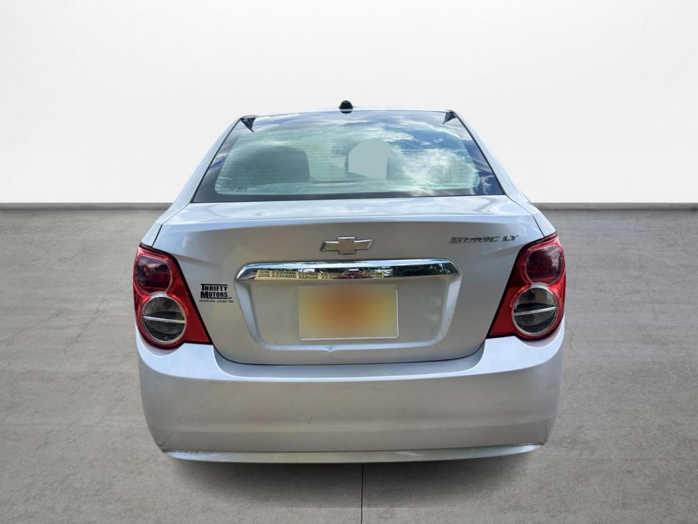 2015 Silver Chevrolet Sonic LT Auto Sedan (1G1JC5SH0F4) with an 1.8L L4 DOHC 24V engine, Automatic transmission, located at 16710 Clay Rd., Houston, TX, 77084, (281) 859-7900, 29.834864, -95.656166 - Low Down. Low Payments. - Photo#5
