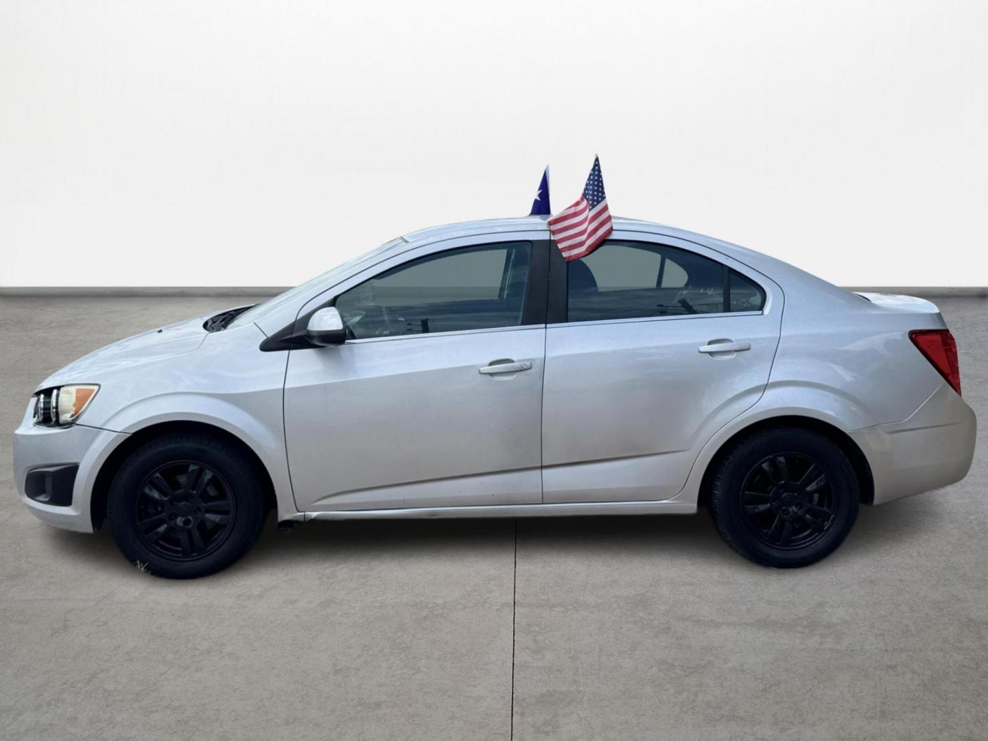 2015 Silver Chevrolet Sonic LT Auto Sedan (1G1JC5SH0F4) with an 1.8L L4 DOHC 24V engine, Automatic transmission, located at 16710 Clay Rd., Houston, TX, 77084, (281) 859-7900, 29.834864, -95.656166 - Low Down. Low Payments. - Photo#7