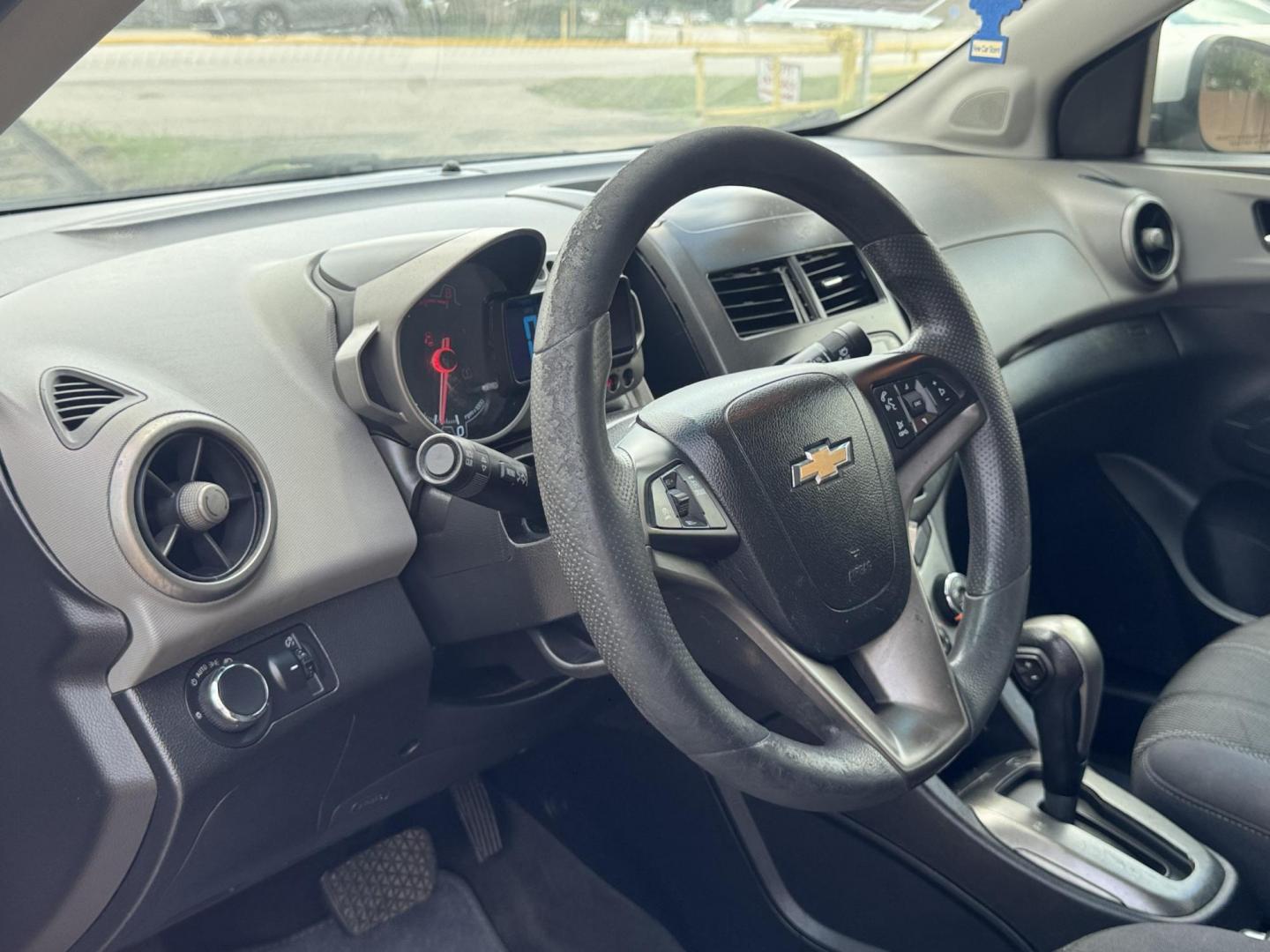 2015 Silver Chevrolet Sonic LT Auto Sedan (1G1JC5SH0F4) with an 1.8L L4 DOHC 24V engine, Automatic transmission, located at 16710 Clay Rd., Houston, TX, 77084, (281) 859-7900, 29.834864, -95.656166 - Low Down. Low Payments. - Photo#8