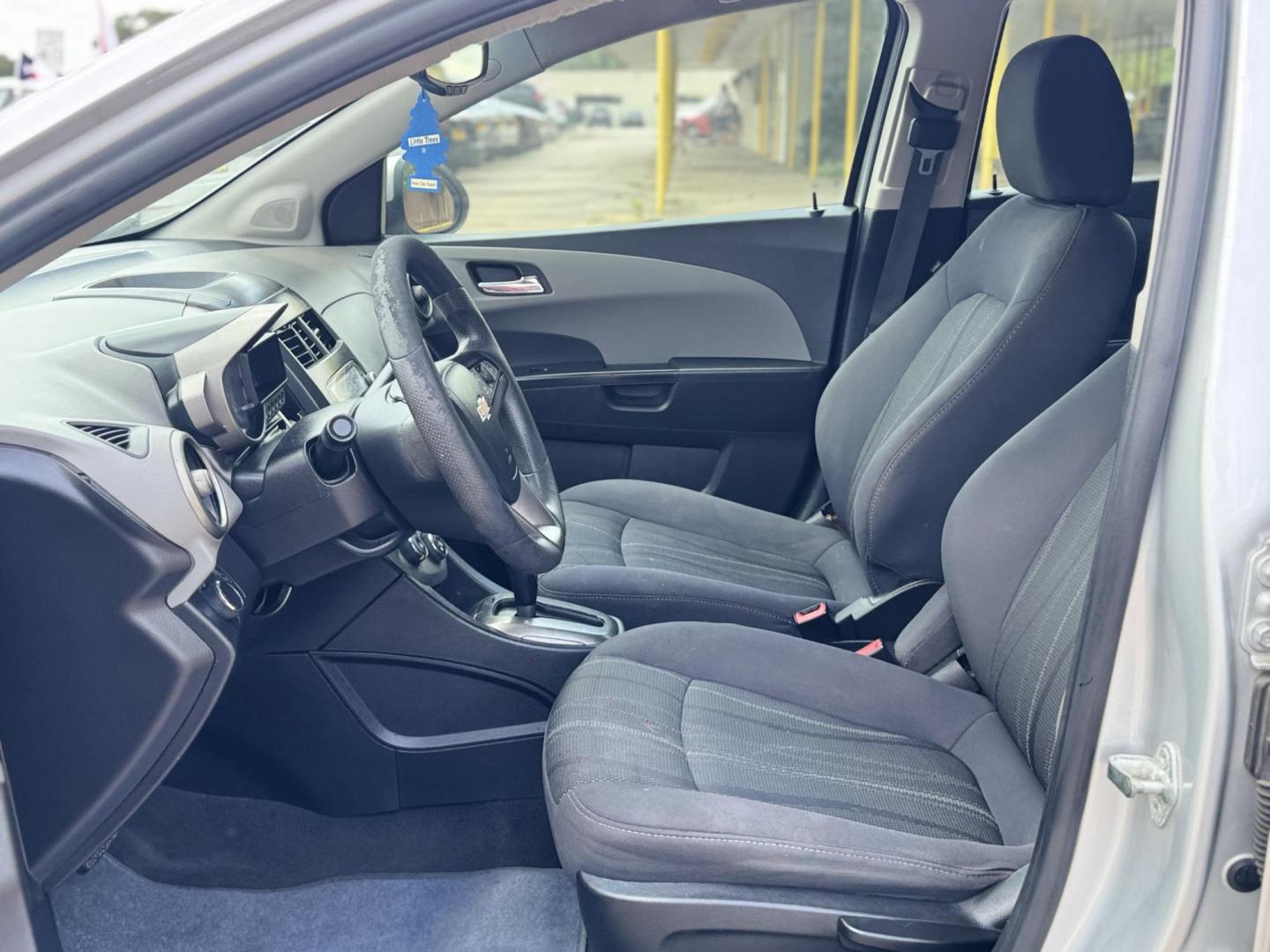 2015 Silver Chevrolet Sonic LT Auto Sedan (1G1JC5SH0F4) with an 1.8L L4 DOHC 24V engine, Automatic transmission, located at 16710 Clay Rd., Houston, TX, 77084, (281) 859-7900, 29.834864, -95.656166 - Low Down. Low Payments. - Photo#11