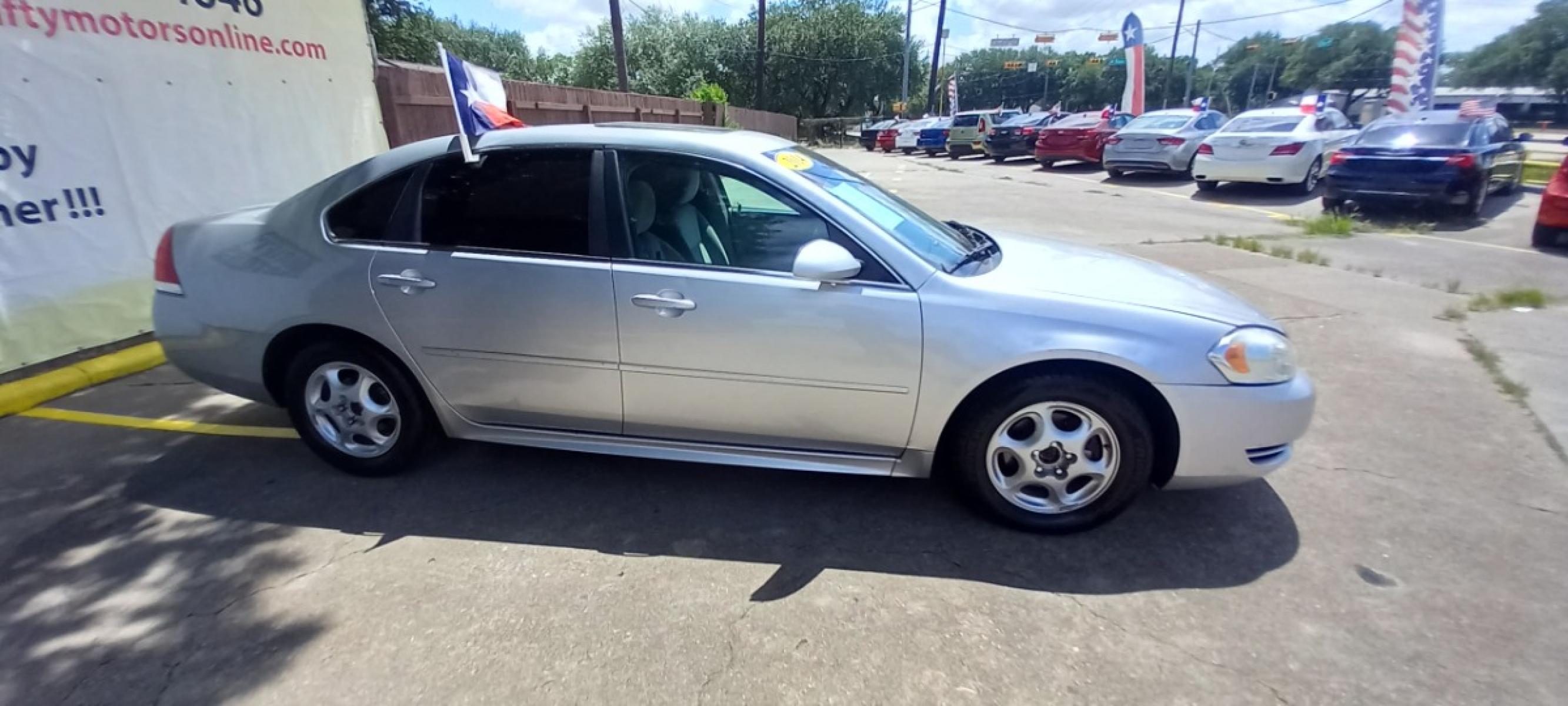 2014 Silver Chevrolet Impala LT (2G1WB5E31E1) with an 3.6L V6 DOHC 16V FFV engine, 6-Speed Automatic transmission, located at 16710 Clay Rd., Houston, TX, 77084, (281) 859-7900, 29.834864, -95.656166 - Photo #3