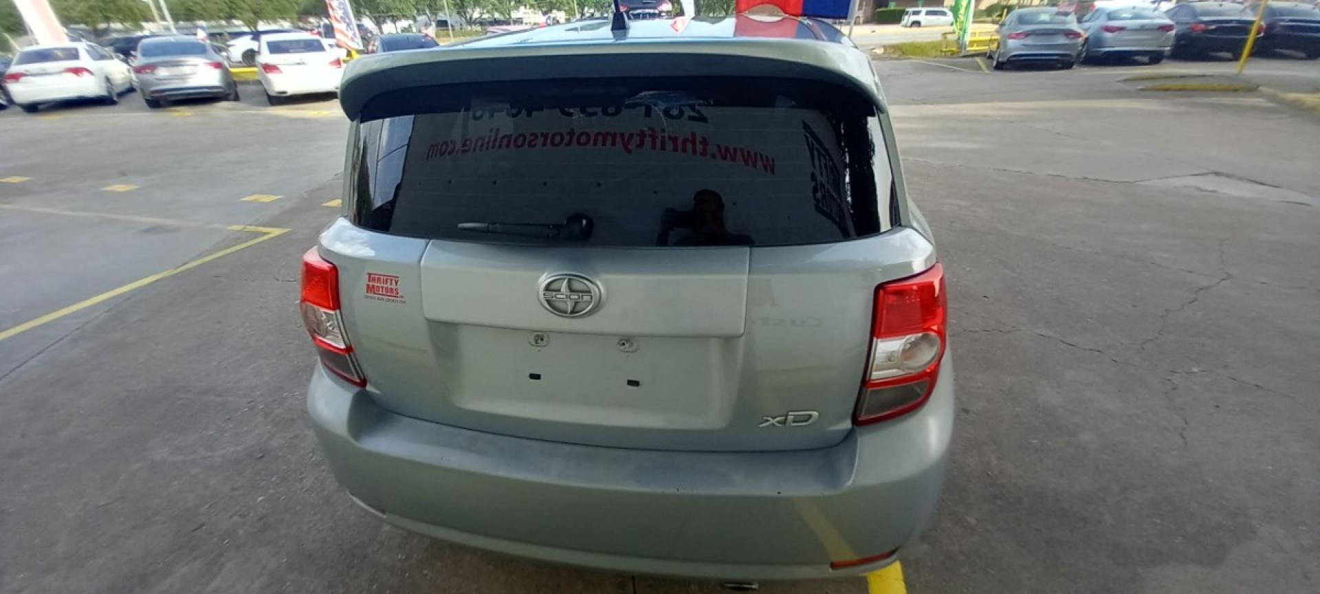 2013 Gray Scion xD 5-Door Hatchback 4-Spd AT (JTKKUPB45D1) with an 1.8L L4 DOHC16V engine, 4-Speed Automatic transmission, located at 16710 Clay Rd., Houston, TX, 77084, (281) 859-7900, 29.834864, -95.656166 - Low Down. Low Payments. - Photo#5