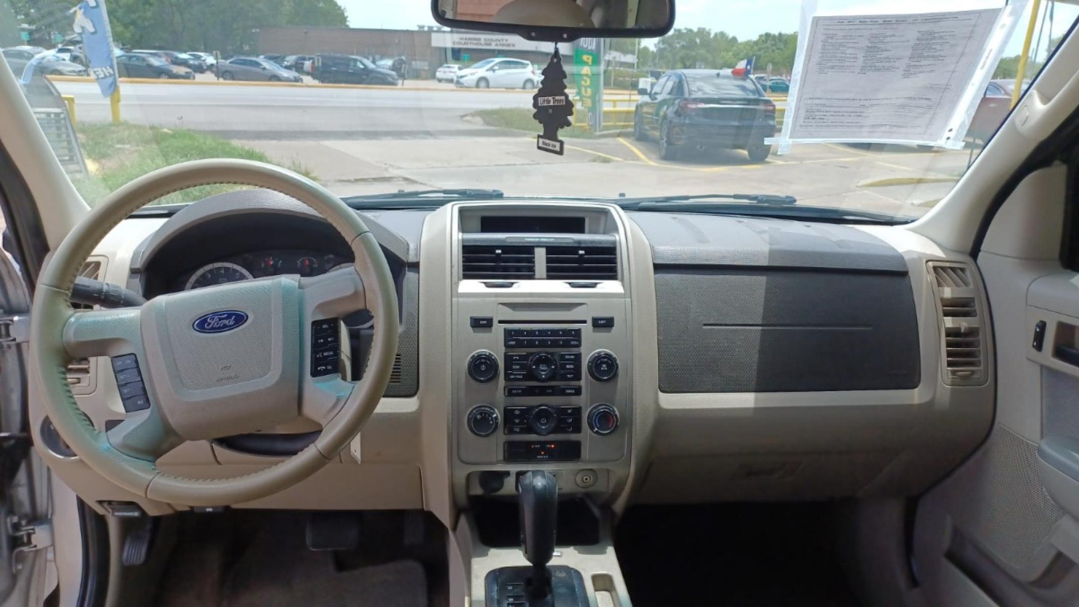 2012 Silver Ford Escape XLT FWD (1FMCU0D78CK) with an 2.5L L4 DOHC 16V engine, 6-Speed Automatic transmission, located at 16710 Clay Rd., Houston, TX, 77084, (281) 859-7900, 29.834864, -95.656166 - Low Down. Low Payments. - Photo #2