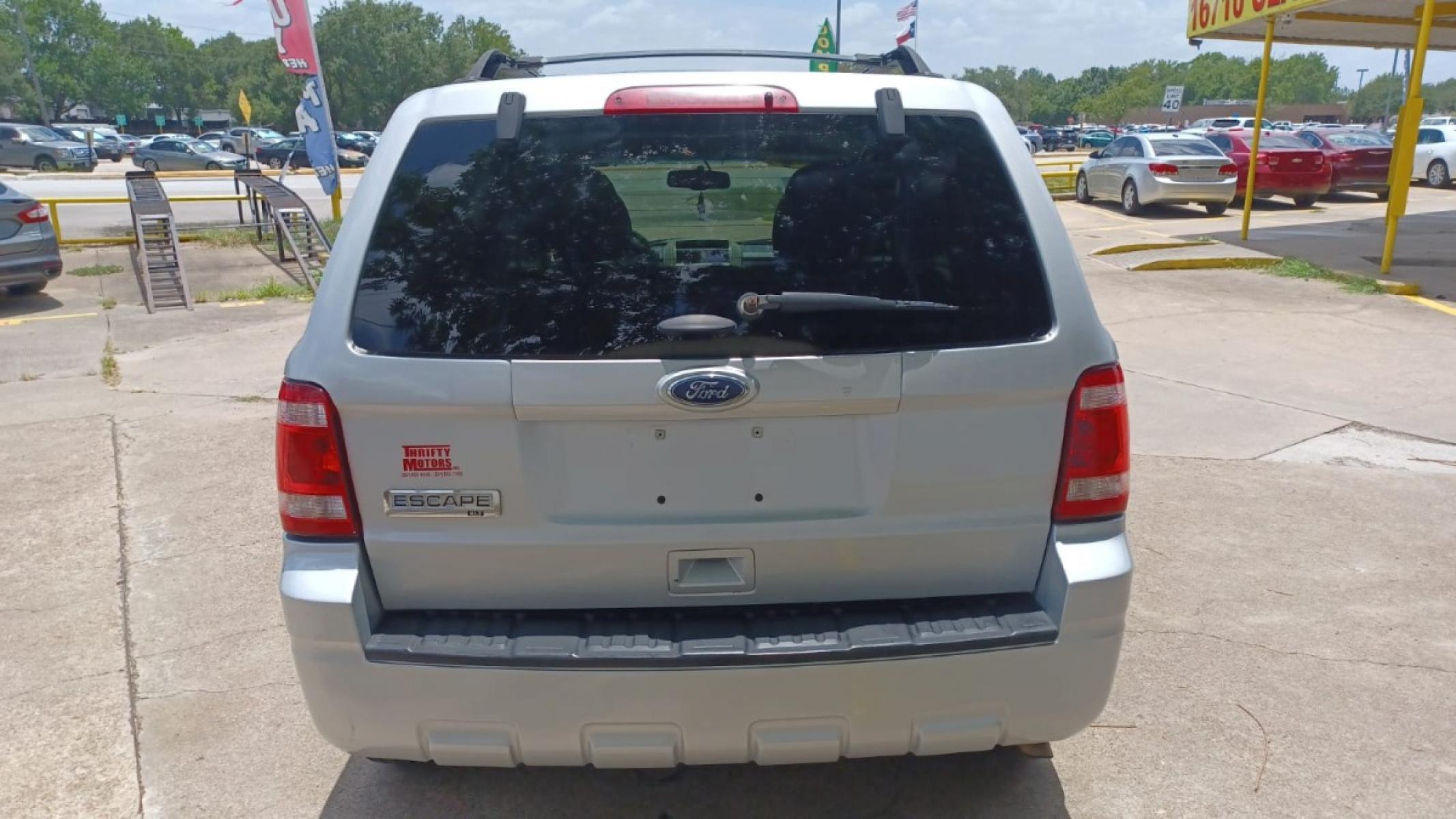 2012 Silver Ford Escape XLT FWD (1FMCU0D78CK) with an 2.5L L4 DOHC 16V engine, 6-Speed Automatic transmission, located at 16710 Clay Rd., Houston, TX, 77084, (281) 859-7900, 29.834864, -95.656166 - Low Down. Low Payments. - Photo #4