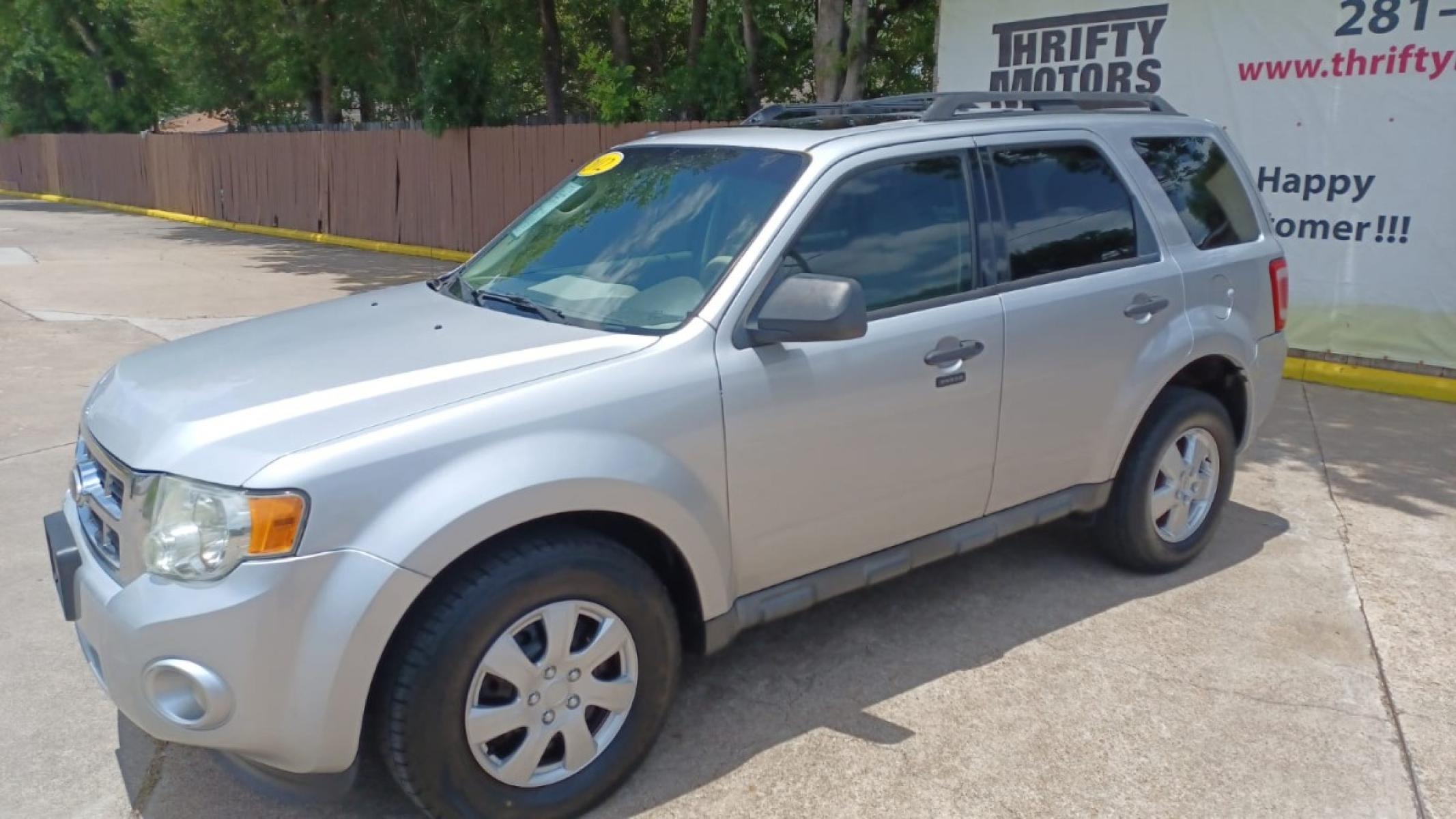 2012 Silver Ford Escape XLT FWD (1FMCU0D78CK) with an 2.5L L4 DOHC 16V engine, 6-Speed Automatic transmission, located at 16710 Clay Rd., Houston, TX, 77084, (281) 859-7900, 29.834864, -95.656166 - Low Down. Low Payments. - Photo #7