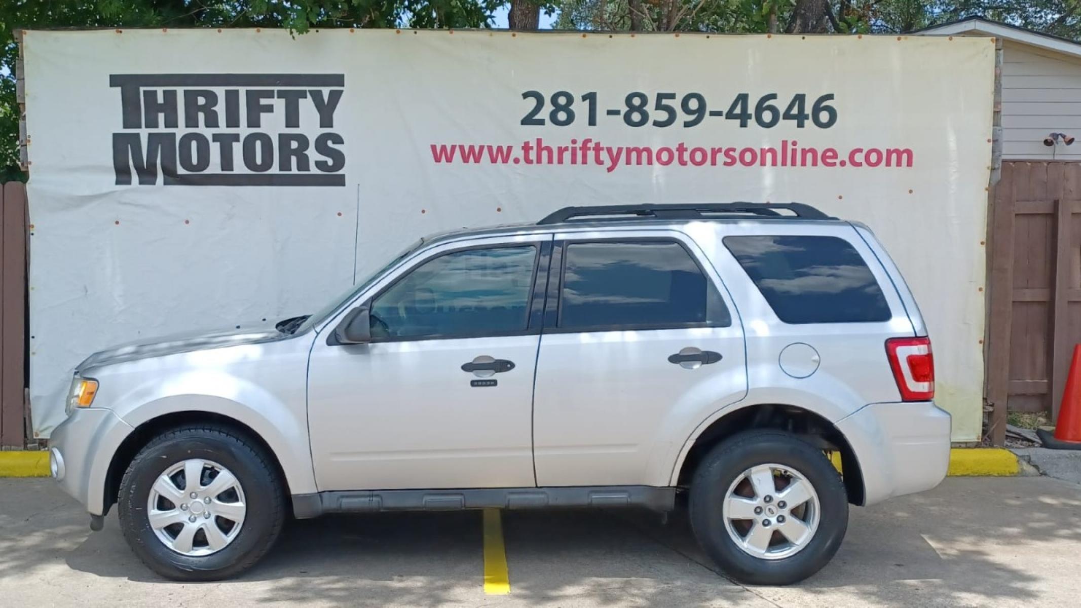 2012 Silver Ford Escape XLT FWD (1FMCU0D78CK) with an 2.5L L4 DOHC 16V engine, 6-Speed Automatic transmission, located at 16710 Clay Rd., Houston, TX, 77084, (281) 859-7900, 29.834864, -95.656166 - Low Down. Low Payments. - Photo #0