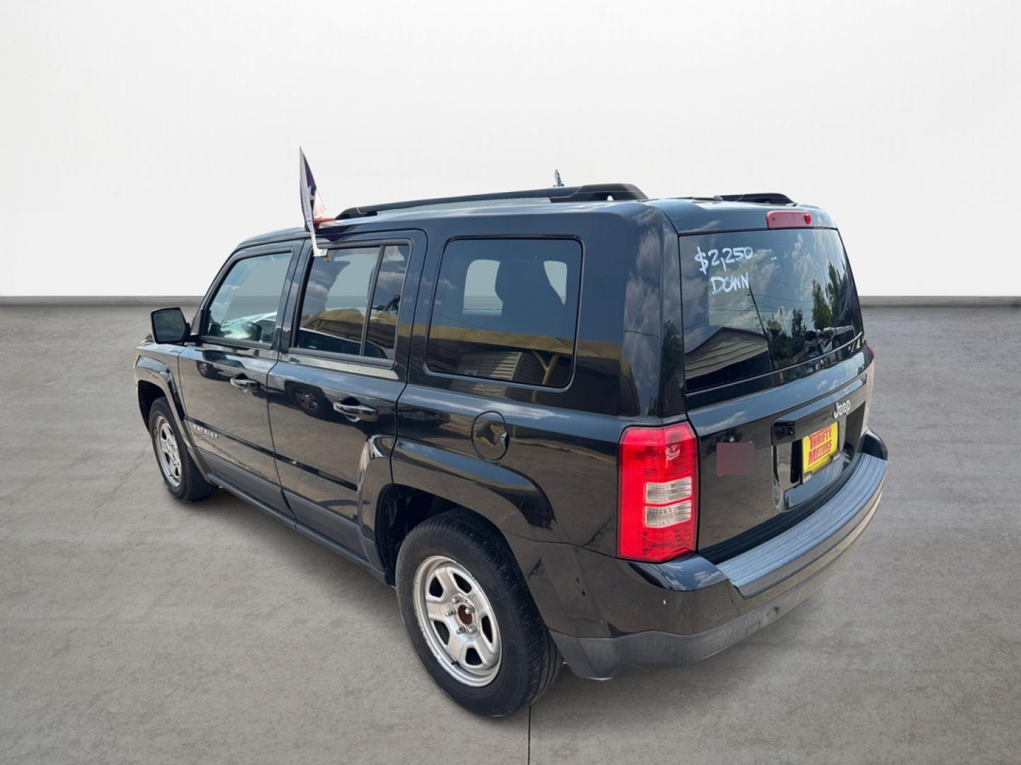 2016 Black Jeep Patriot Sport 2WD (1C4NJPBAXGD) with an 2.0L L4 DOHC 16V engine, located at 16710 Clay Rd., Houston, TX, 77084, (281) 859-7900, 29.834864, -95.656166 - Low Down. Low Payments. - Photo#6
