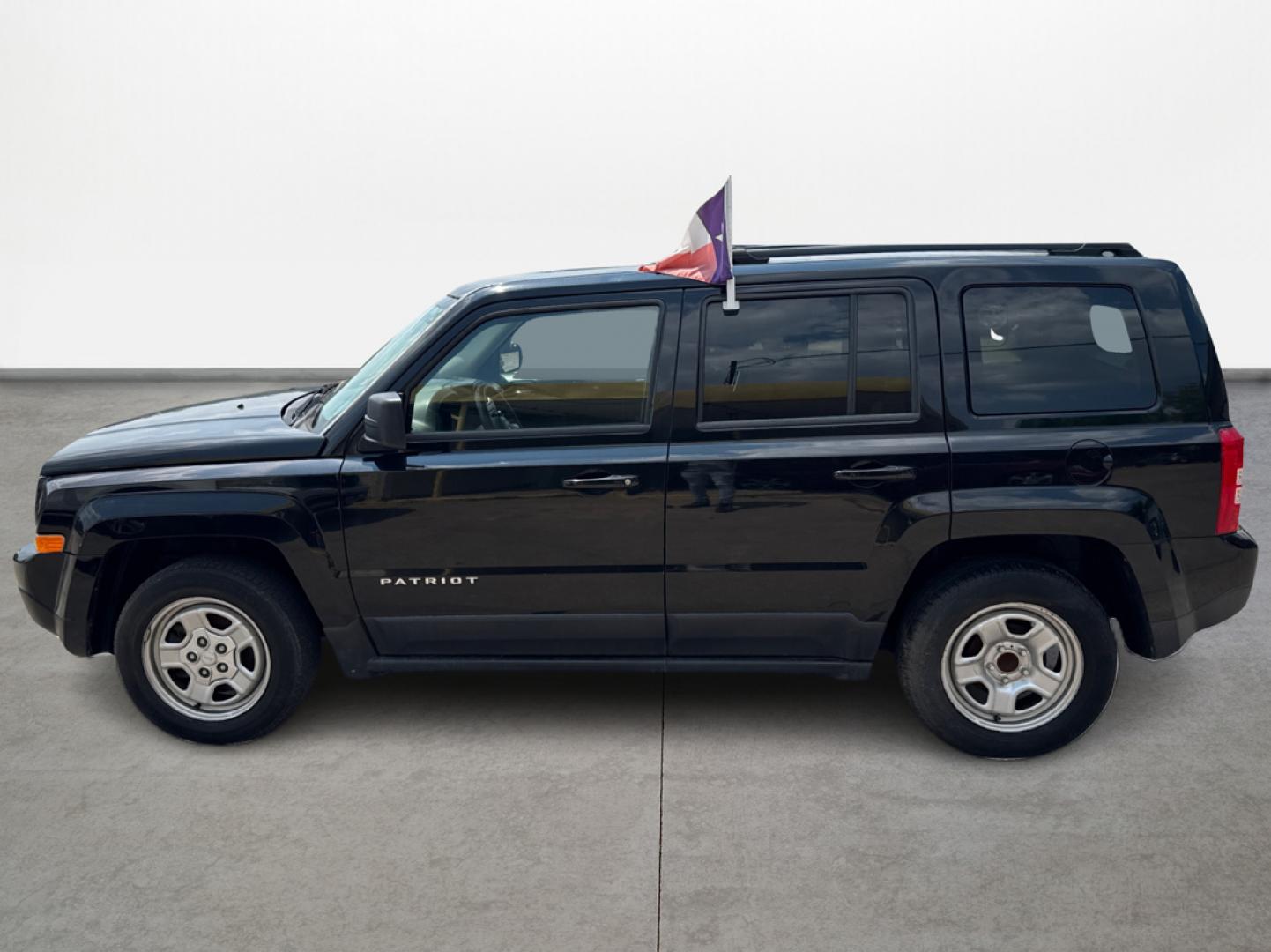 2016 Black Jeep Patriot Sport 2WD (1C4NJPBAXGD) with an 2.0L L4 DOHC 16V engine, located at 16710 Clay Rd., Houston, TX, 77084, (281) 859-7900, 29.834864, -95.656166 - Low Down. Low Payments. - Photo#7