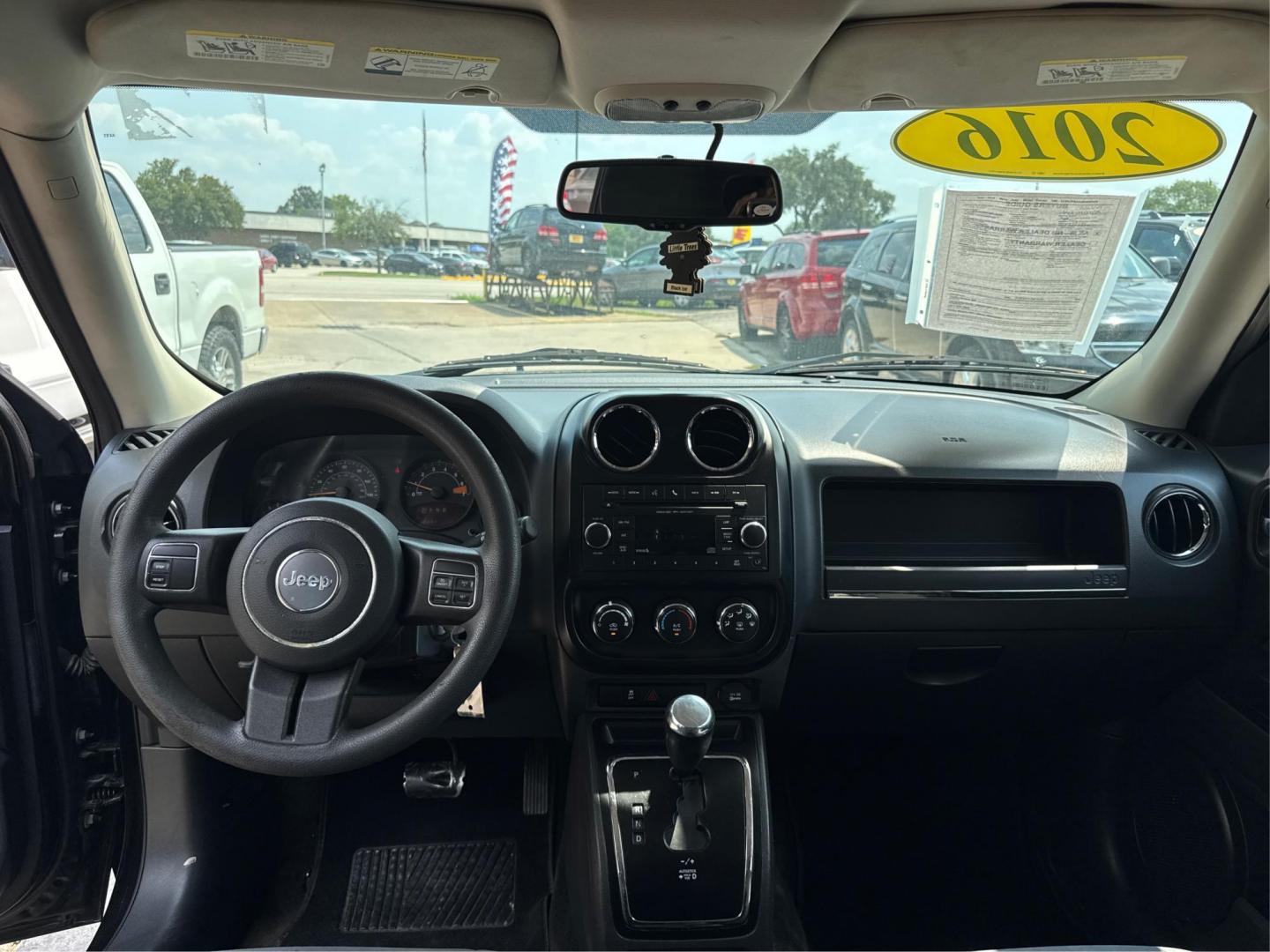 2016 Black Jeep Patriot Sport 2WD (1C4NJPBAXGD) with an 2.0L L4 DOHC 16V engine, located at 16710 Clay Rd., Houston, TX, 77084, (281) 859-7900, 29.834864, -95.656166 - Low Down. Low Payments. - Photo#10