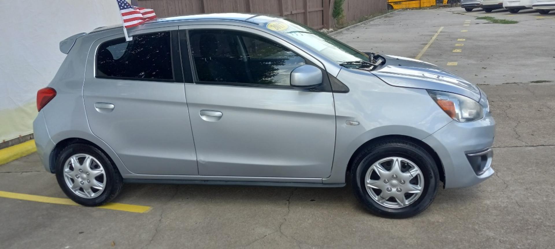 2017 Gray Mitsubishi Mirage ES 5M (ML32A3HJ2HH) with an 1.2L L3 DOHC engine, 5M transmission, located at 16710 Clay Rd., Houston, TX, 77084, (281) 859-7900, 29.834864, -95.656166 - Photo#4