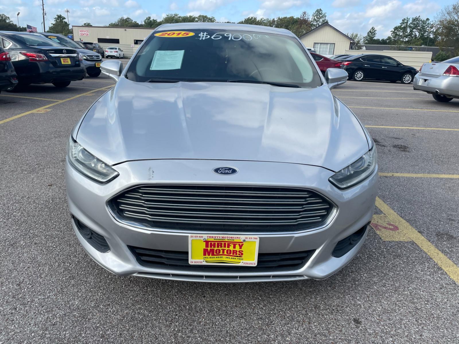 2015 Silver Ford Fusion SE (3FA6P0H94FR) with an 2.0L L4 DOHC 16V engine, located at 16710 Clay Rd., Houston, TX, 77084, (281) 859-7900, 29.834864, -95.656166 - Photo #1