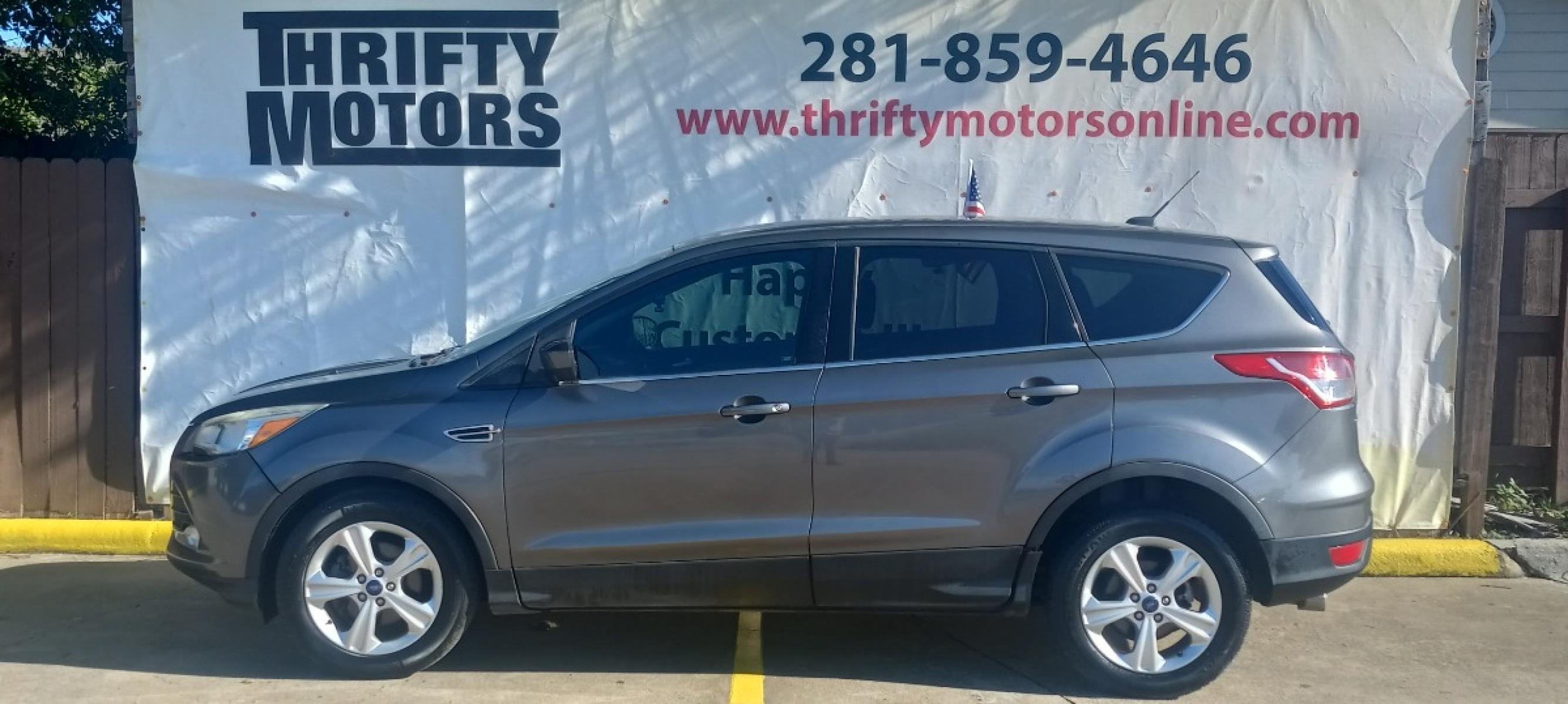 2013 Gray Ford Escape SE FWD (1FMCU0GX6DU) with an 1.6L L4 DOHC 16V engine, 6-Speed Automatic transmission, located at 16710 Clay Rd., Houston, TX, 77084, (281) 859-7900, 29.834864, -95.656166 - Low Down. Low Payments. - Photo #0