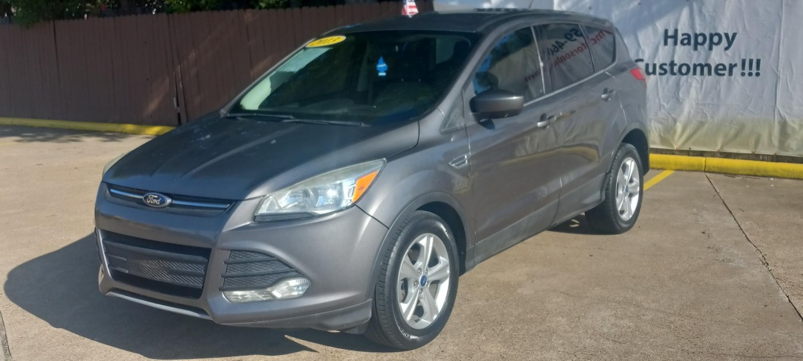 2013 Gray Ford Escape SE FWD (1FMCU0GX6DU) with an 1.6L L4 DOHC 16V engine, 6-Speed Automatic transmission, located at 16710 Clay Rd., Houston, TX, 77084, (281) 859-7900, 29.834864, -95.656166 - Low Down. Low Payments. - Photo #2