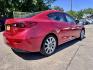 2017 Red /Black Mazda MAZDA3 i Touring AT 4-Door (JM1BN1V76H1) with an 2.0L L4 DOHC 16V engine, Automatic 6-Speed transmission, located at 16710 Clay Rd., Houston, TX, 77084, (281) 859-7900, 29.834864, -95.656166 - Low Dow. Low Payments. - Photo#2
