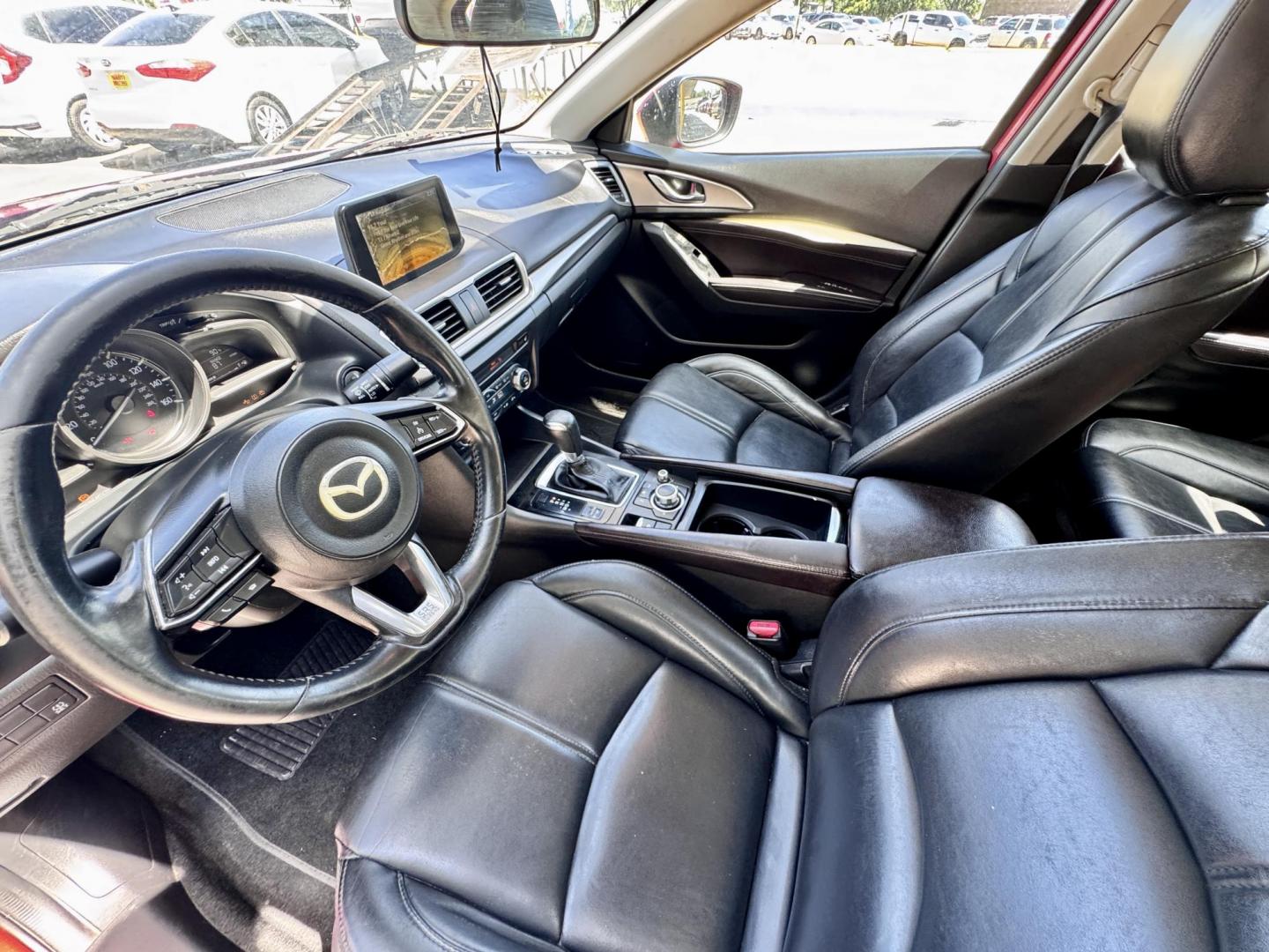 2017 Red /Black Mazda MAZDA3 i Touring AT 4-Door (JM1BN1V76H1) with an 2.0L L4 DOHC 16V engine, Automatic 6-Speed transmission, located at 16710 Clay Rd., Houston, TX, 77084, (281) 859-7900, 29.834864, -95.656166 - Low Dow. Low Payments. - Photo#8