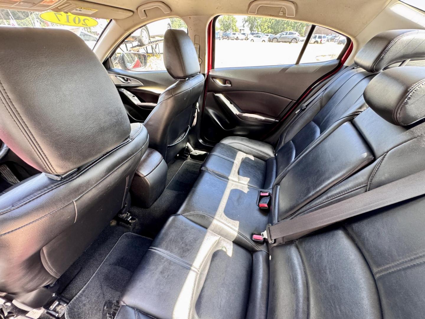 2017 Red /Black Mazda MAZDA3 i Touring AT 4-Door (JM1BN1V76H1) with an 2.0L L4 DOHC 16V engine, Automatic 6-Speed transmission, located at 16710 Clay Rd., Houston, TX, 77084, (281) 859-7900, 29.834864, -95.656166 - Low Dow. Low Payments. - Photo#9